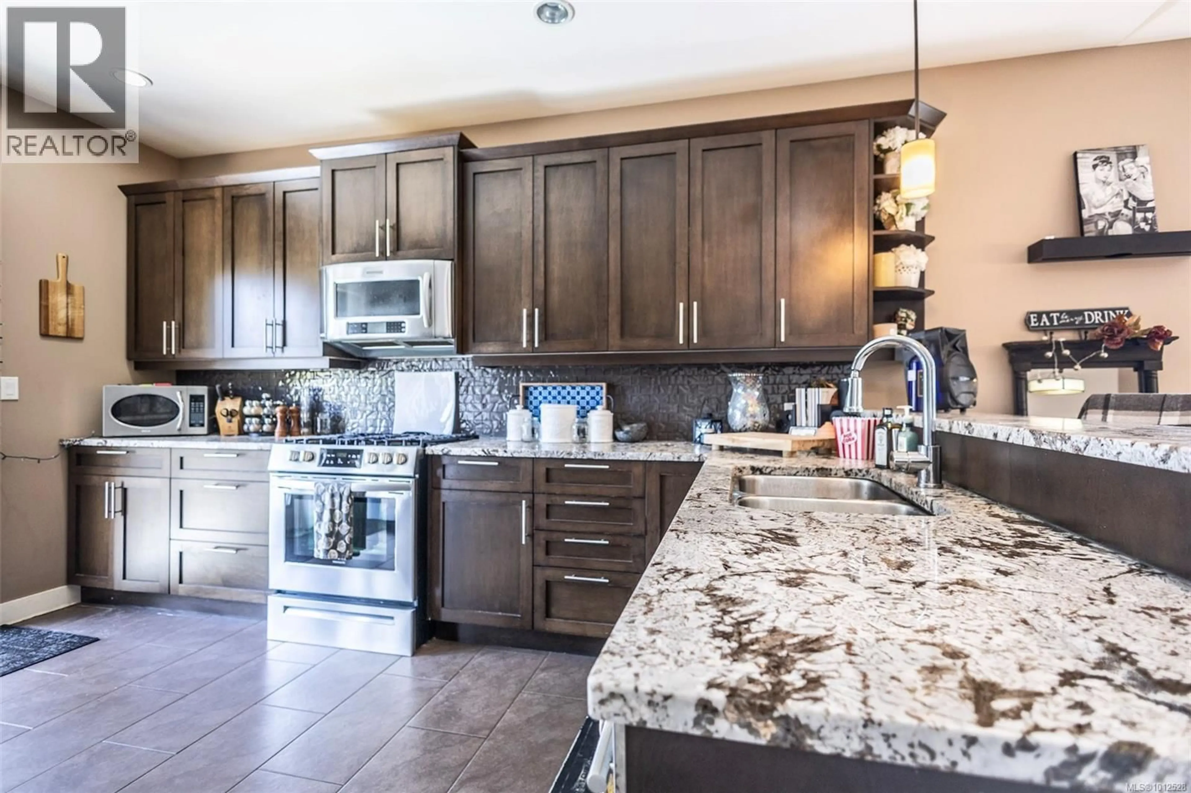 Open concept kitchen, ceramic/tile floor for 3353 SEWELL ROAD, Colwood British Columbia V9C0B9