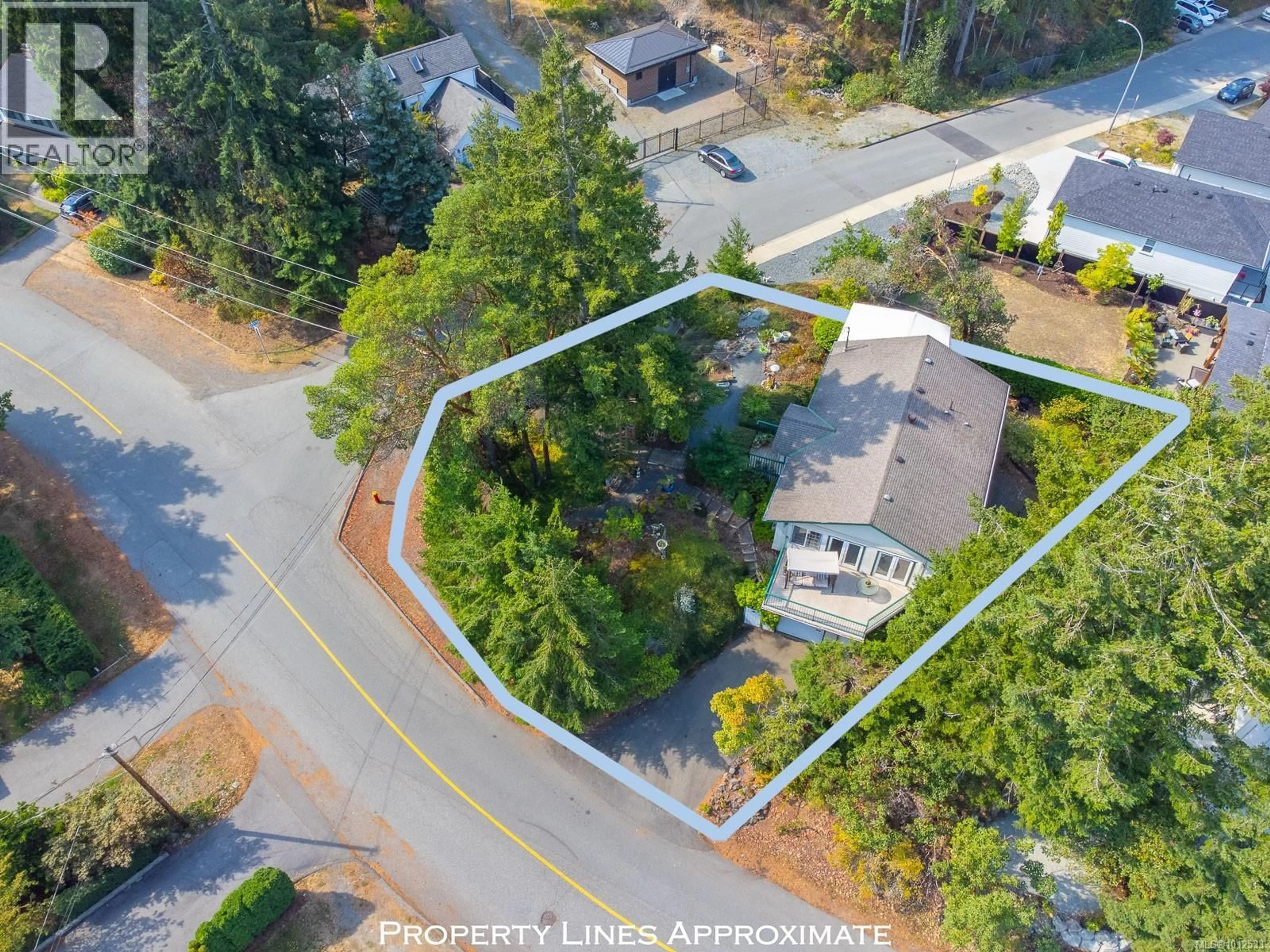 A pic from outside/outdoor area/front of a property/back of a property/a pic from drone, street for 1300 LANGARA DRIVE, Nanaimo British Columbia V9R6A8