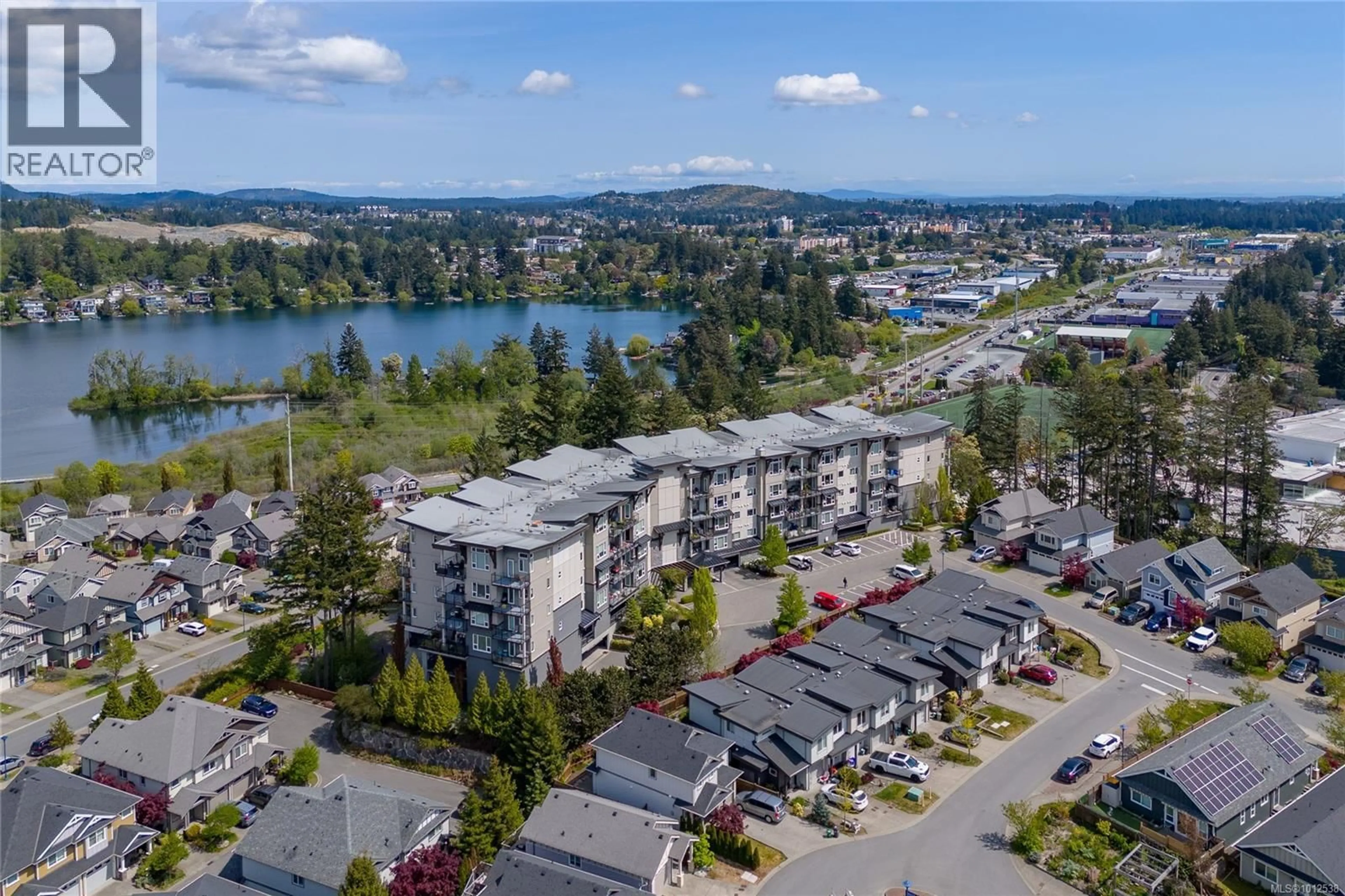 A pic from outside/outdoor area/front of a property/back of a property/a pic from drone, water/lake/river/ocean view for 415 - 1145 SIKORSKY ROAD, Langford British Columbia V9B0M8