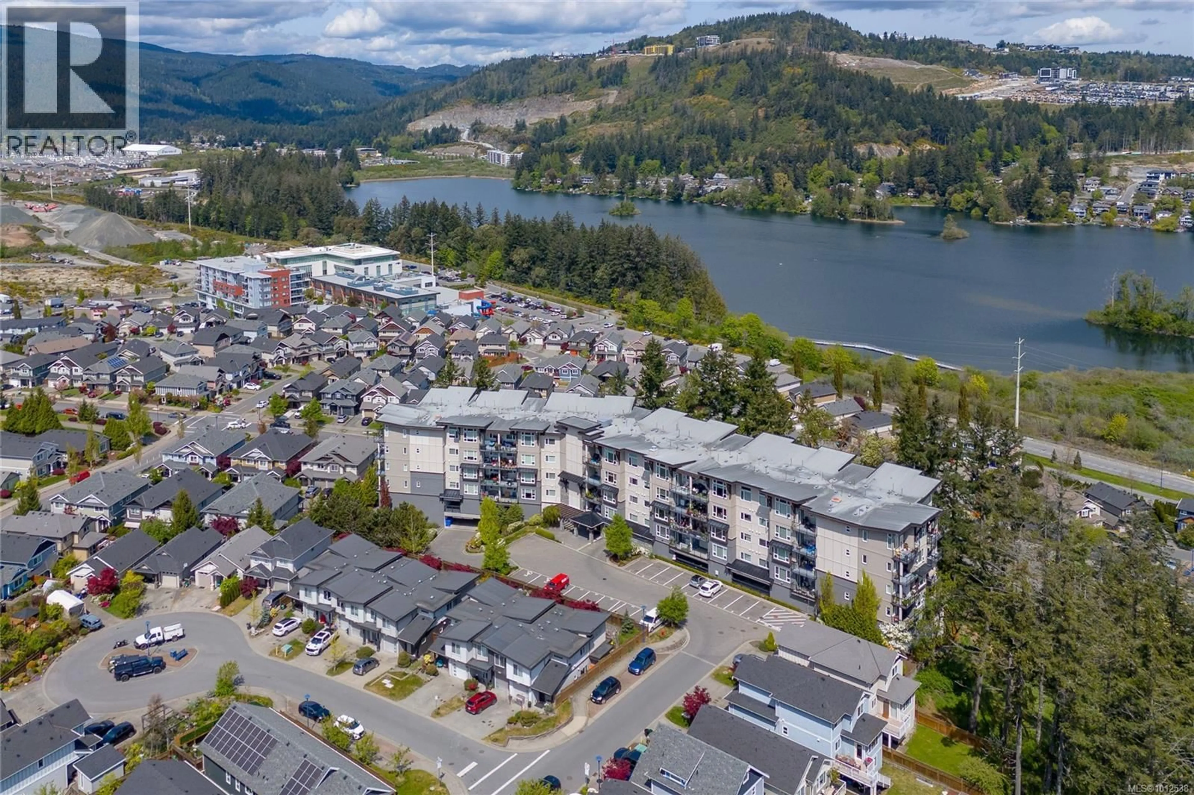 A pic from outside/outdoor area/front of a property/back of a property/a pic from drone, water/lake/river/ocean view for 415 - 1145 SIKORSKY ROAD, Langford British Columbia V9B0M8