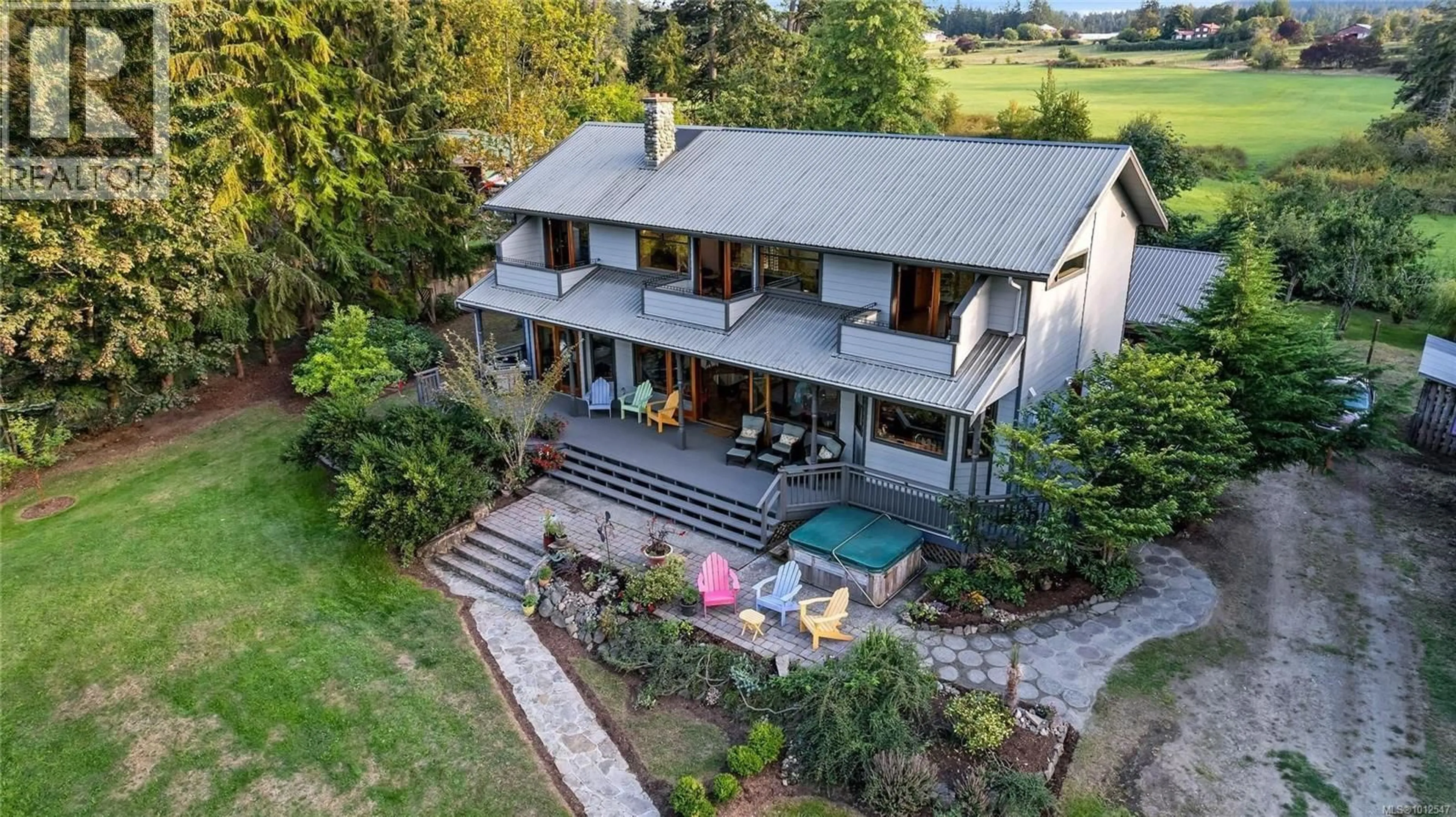 A pic from outside/outdoor area/front of a property/back of a property/a pic from drone, unknown for 1214 NORTH BEACH ROAD, Salt Spring British Columbia V8K1B3