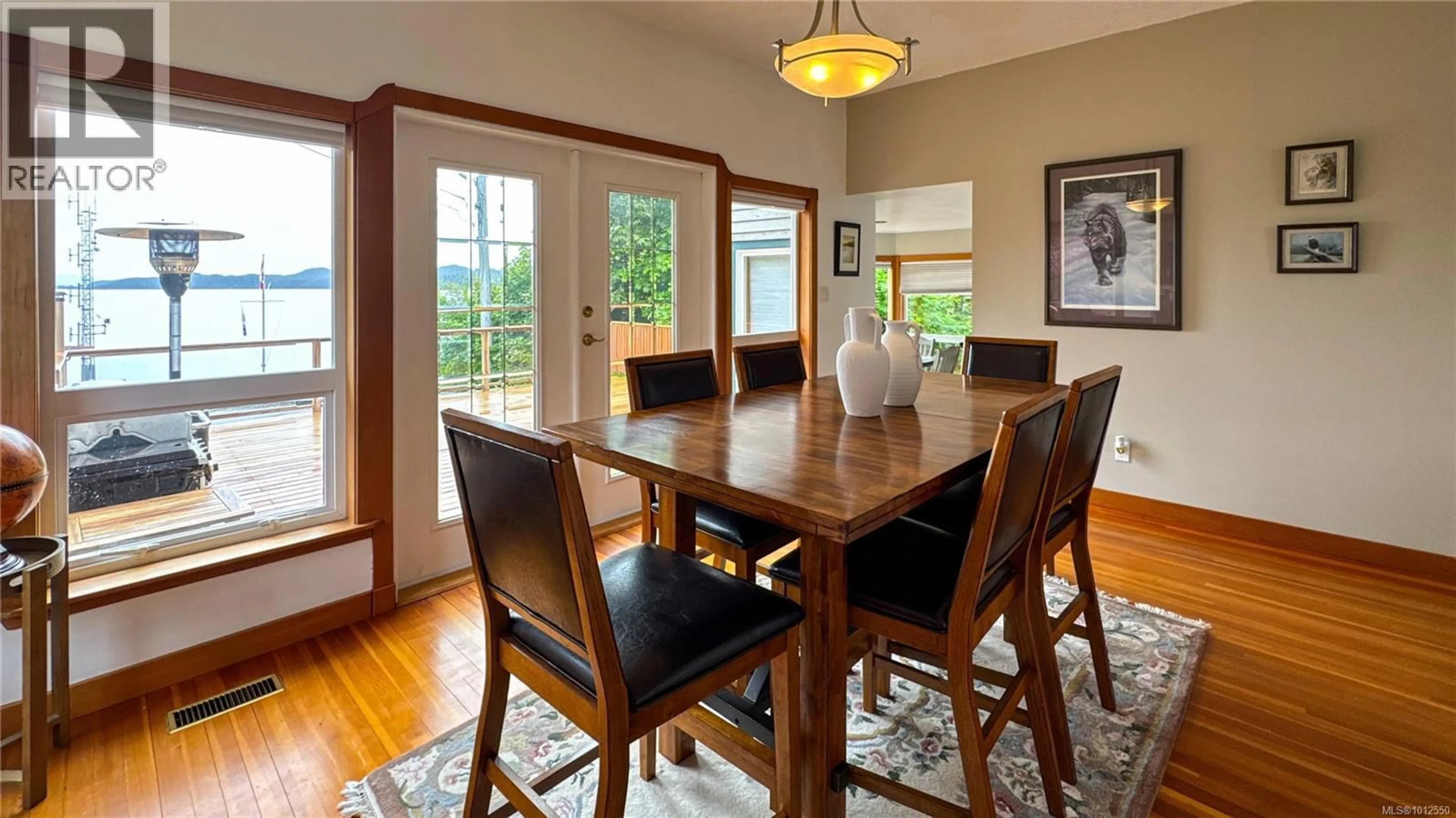Dining room, wood/laminate floor for 7085 SHORNCLIFFE AVENUE, Port Hardy British Columbia V0N2P0