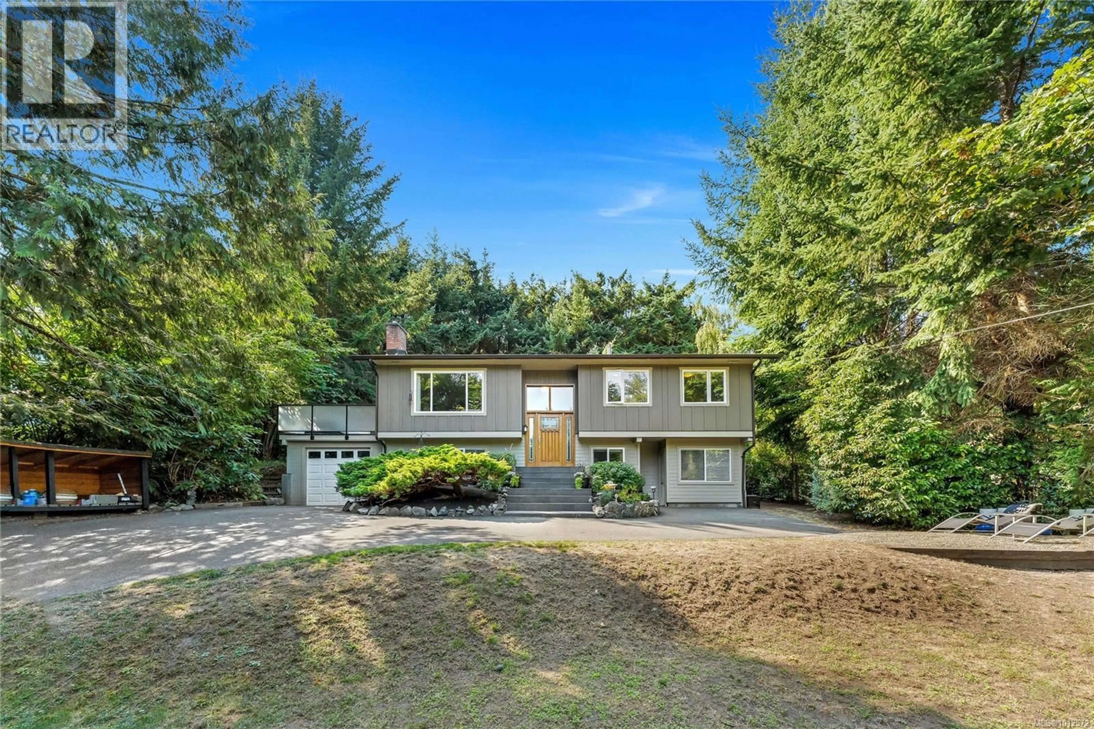 A pic from outside/outdoor area/front of a property/back of a property/a pic from drone, street for 5222 BECKTON ROAD, Saanich British Columbia V8Y2C1