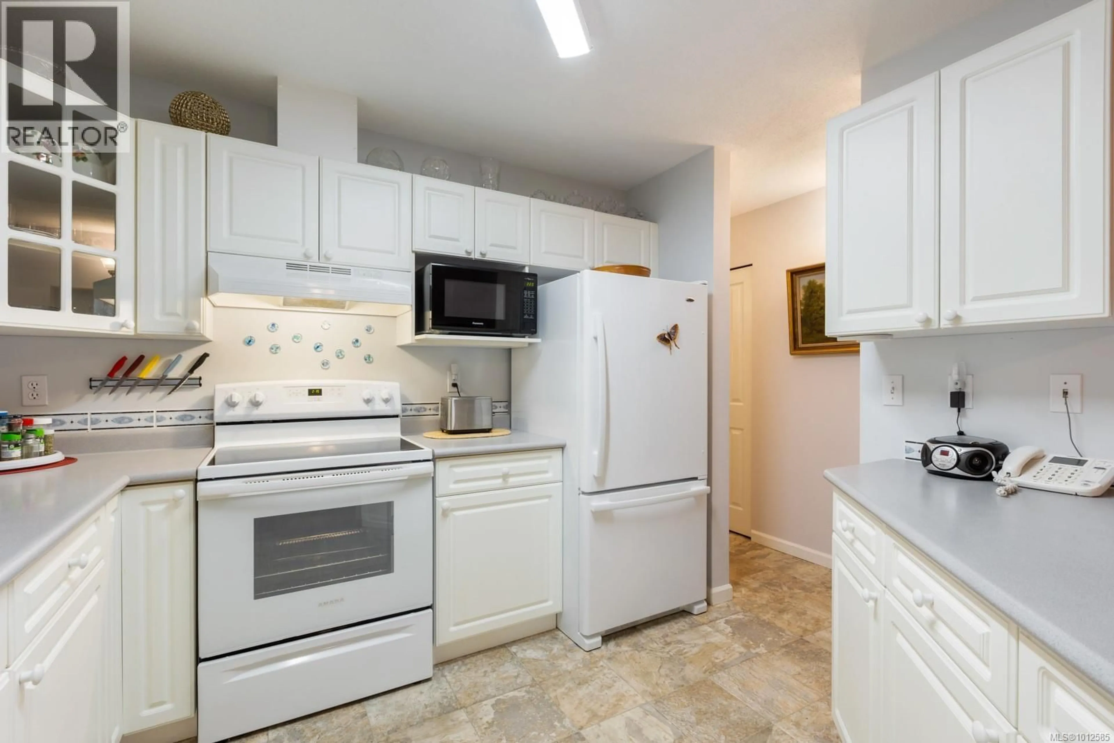 Standard kitchen, ceramic/tile floor for 206 - 1970 COMOX AVENUE, Comox British Columbia V9M3M7