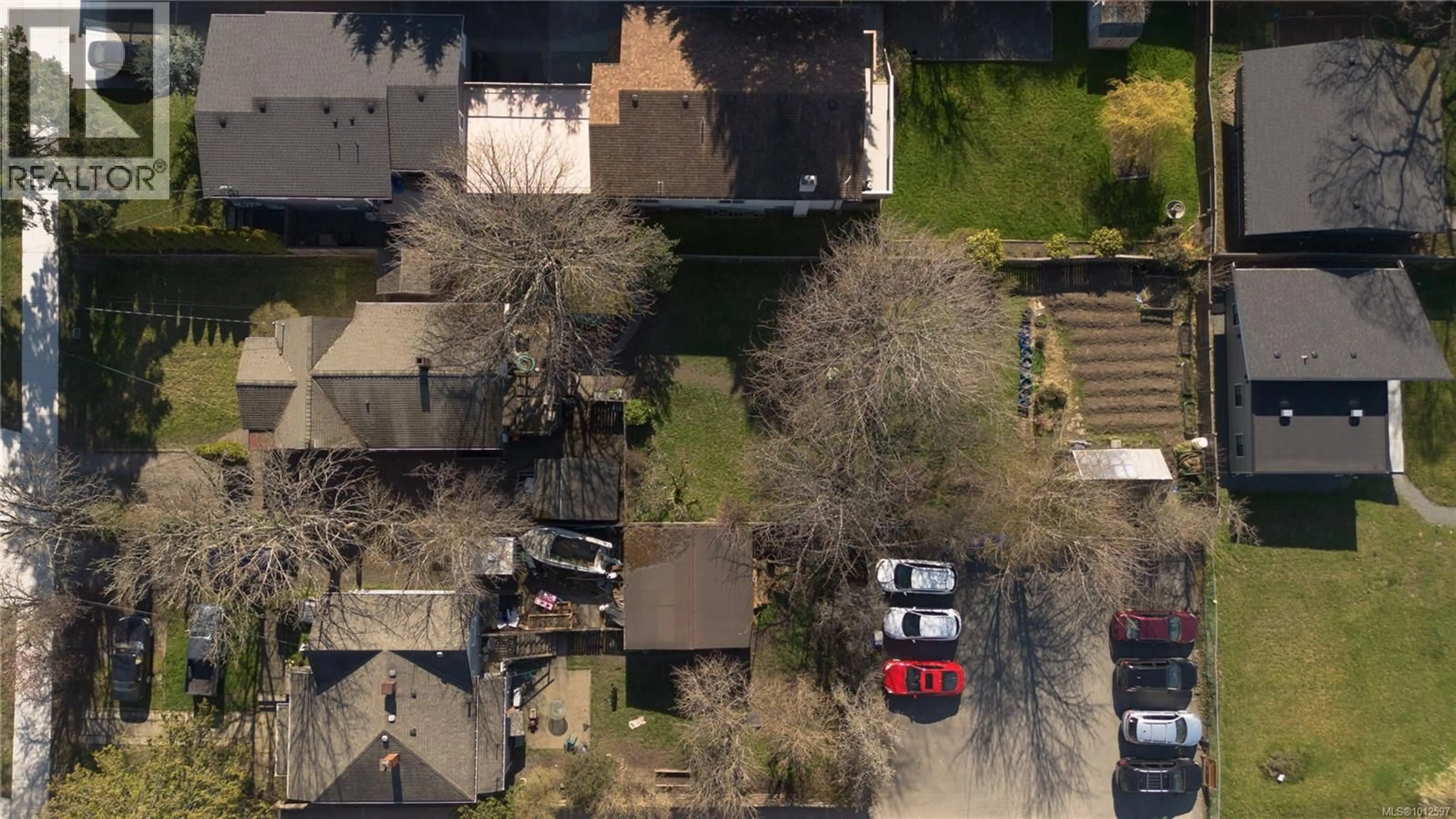 A pic from outside/outdoor area/front of a property/back of a property/a pic from drone, street for 3228 SEATON STREET, Saanich British Columbia V8Z3V7