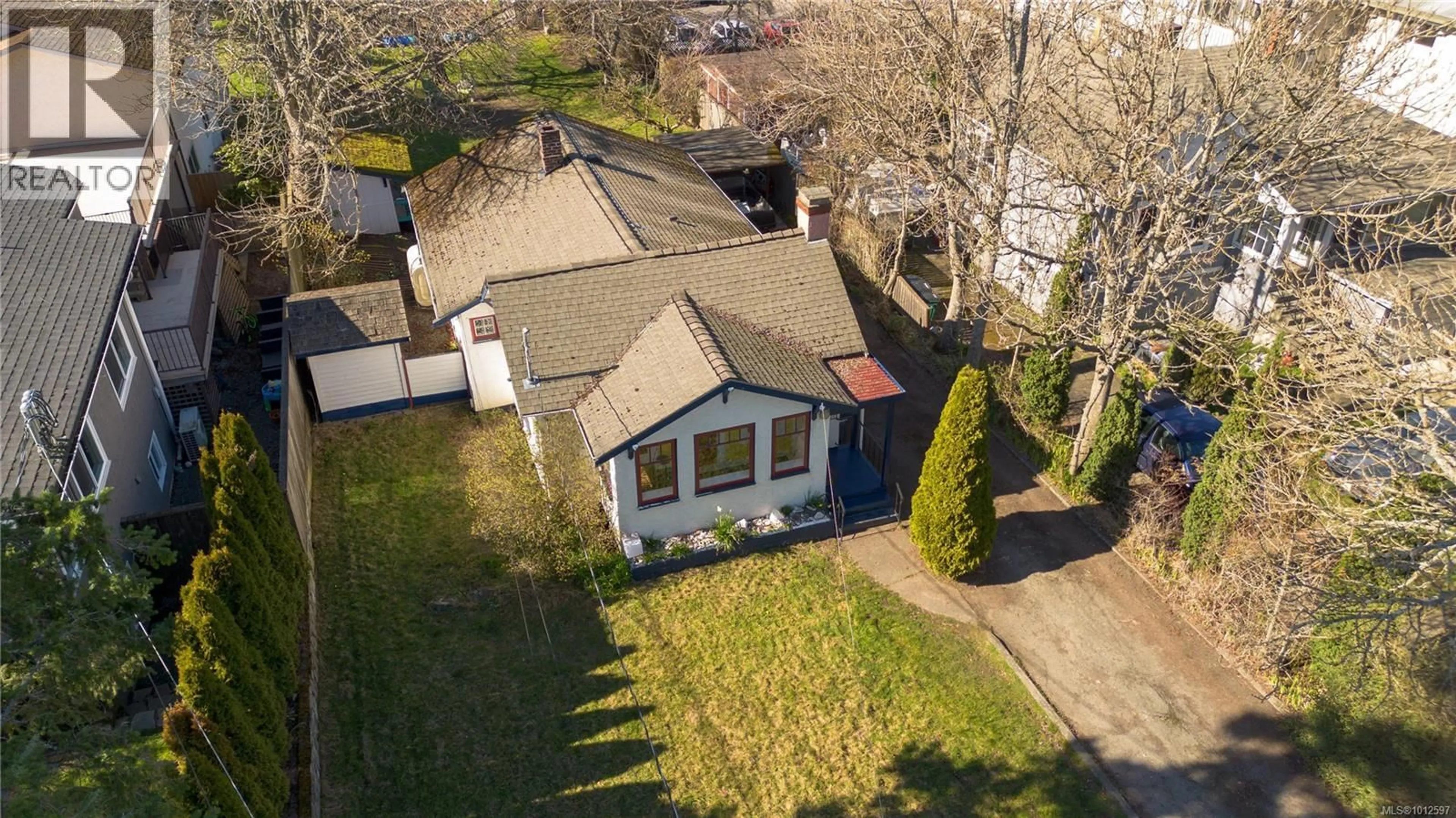 A pic from outside/outdoor area/front of a property/back of a property/a pic from drone, street for 3228 SEATON STREET, Saanich British Columbia V8Z3V7