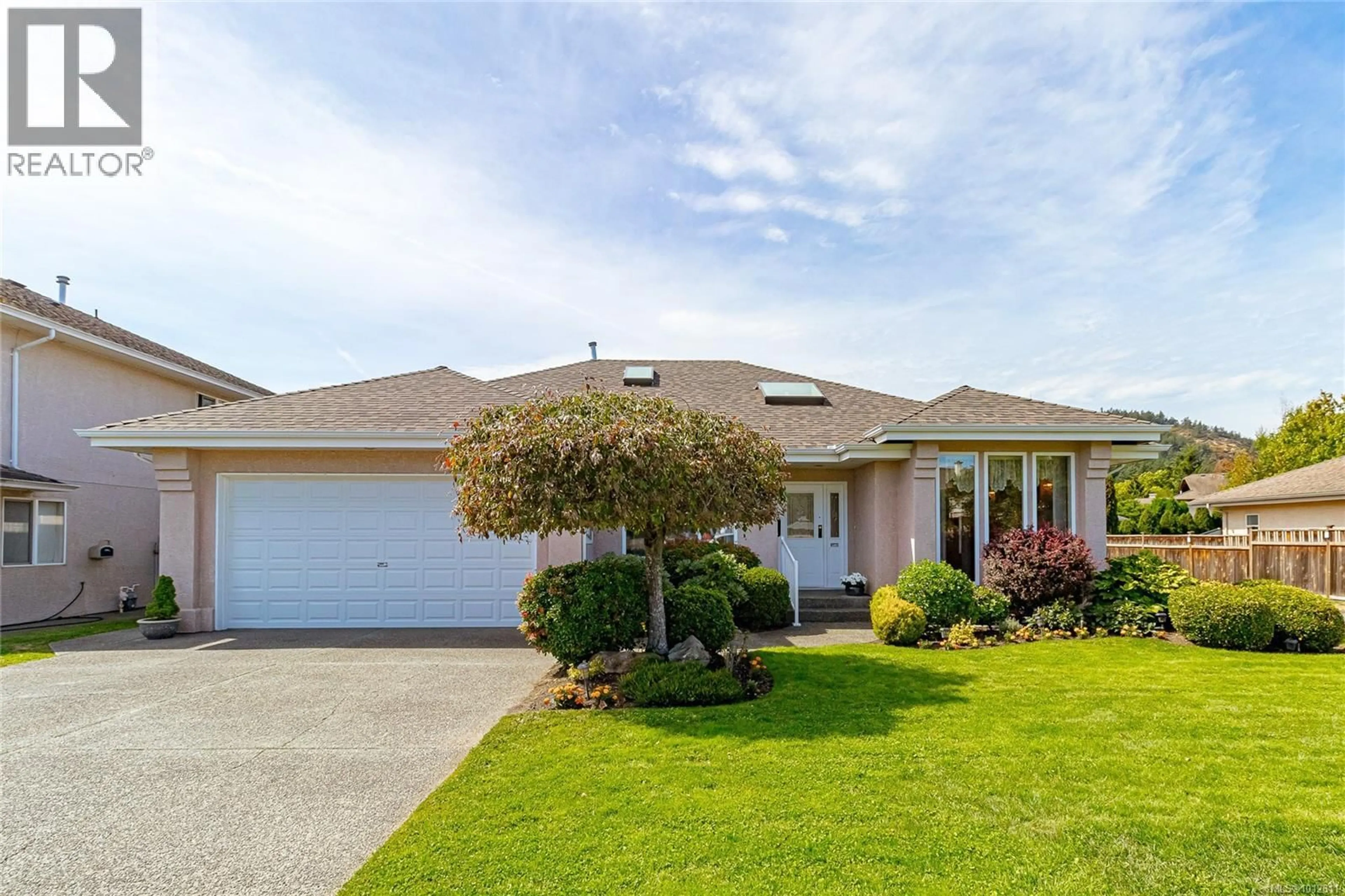 A pic from outside/outdoor area/front of a property/back of a property/a pic from drone, street for 4302 INDIGO LANE, Saanich British Columbia V8N6L1