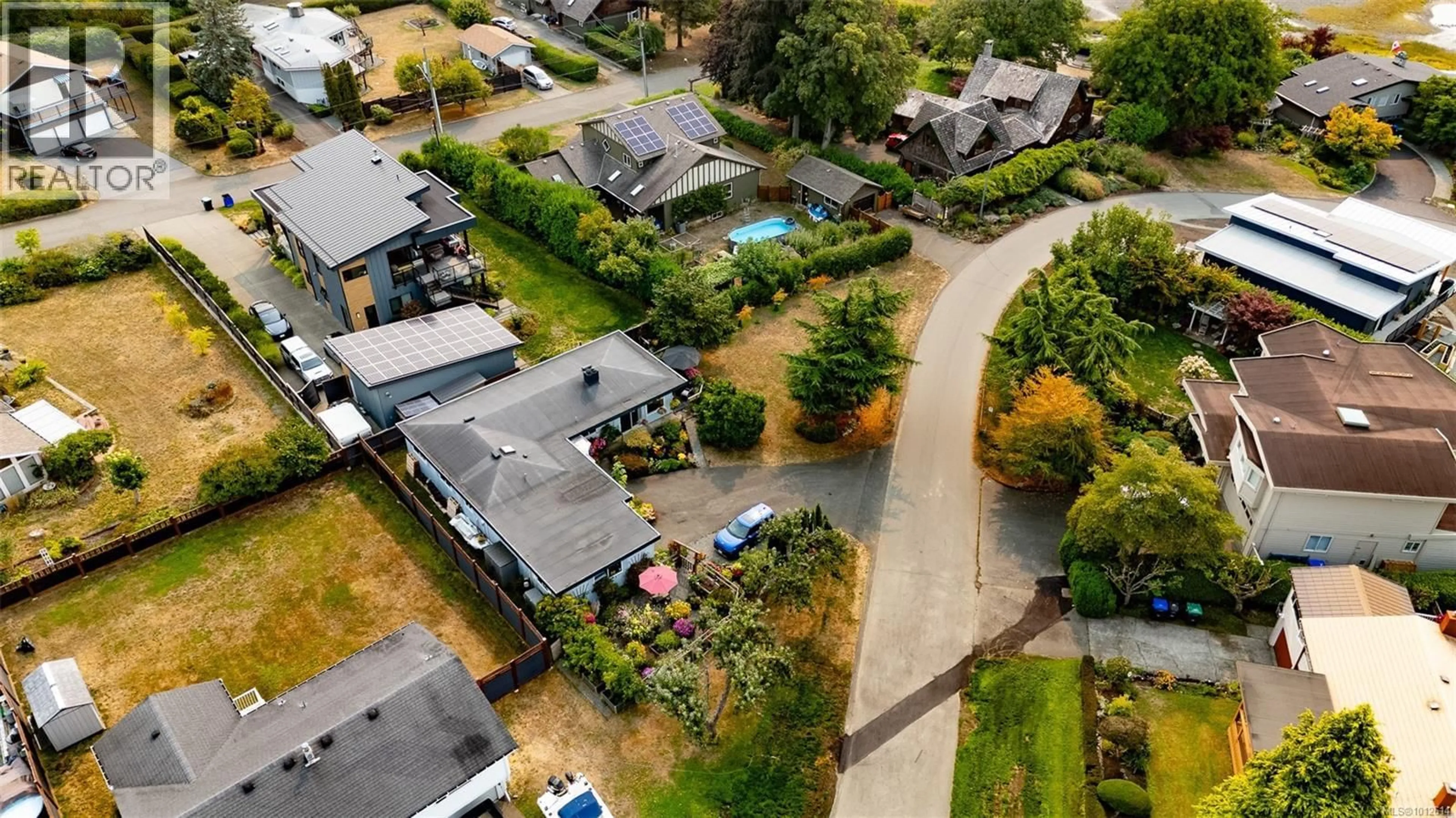 A pic from outside/outdoor area/front of a property/back of a property/a pic from drone, street for 140 BEACH DRIVE, Comox British Columbia V9M1T6