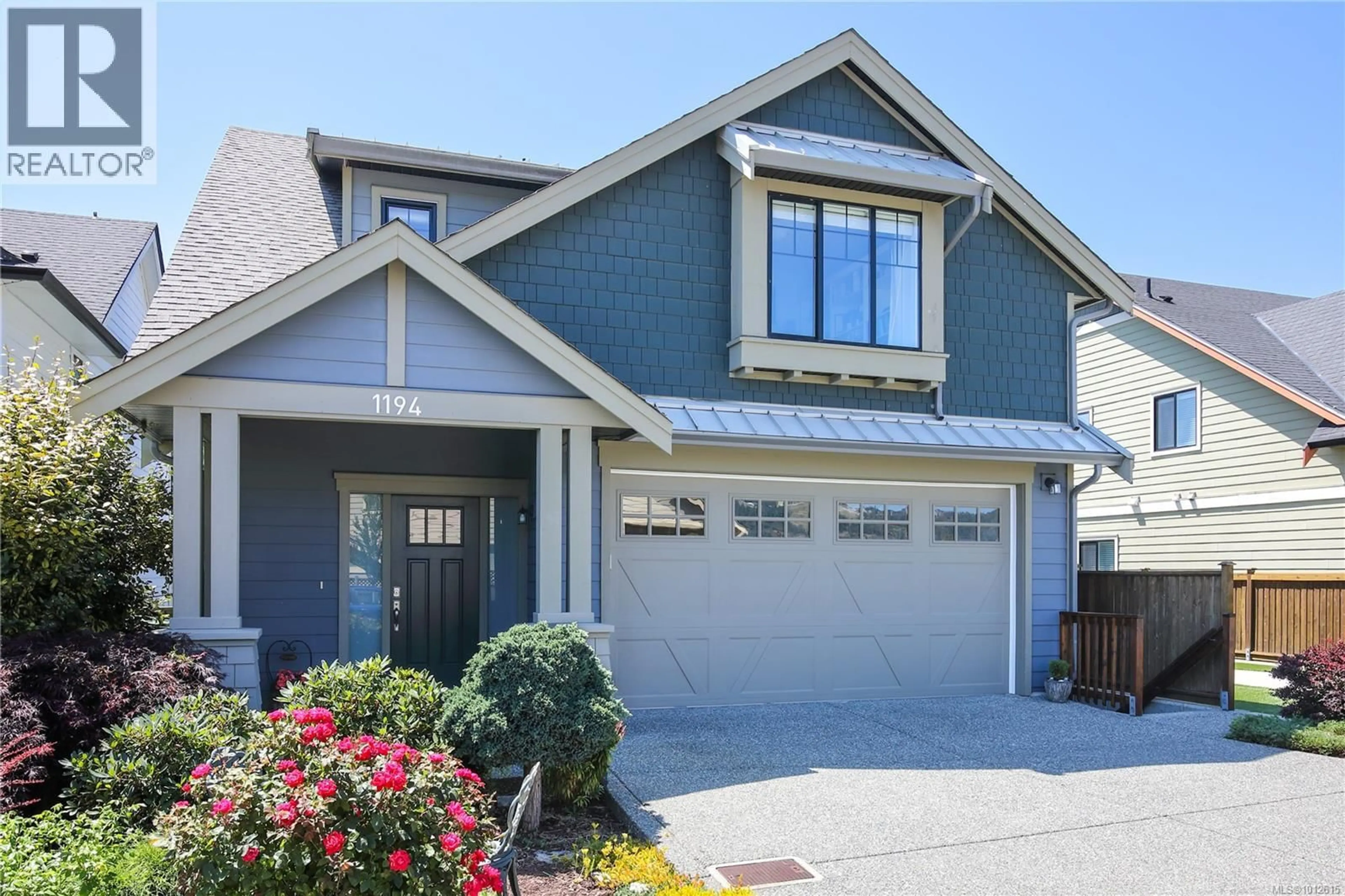 Home with vinyl exterior material, street for 1194 BOMBARDIER CRESCENT, Langford British Columbia V9B0R2
