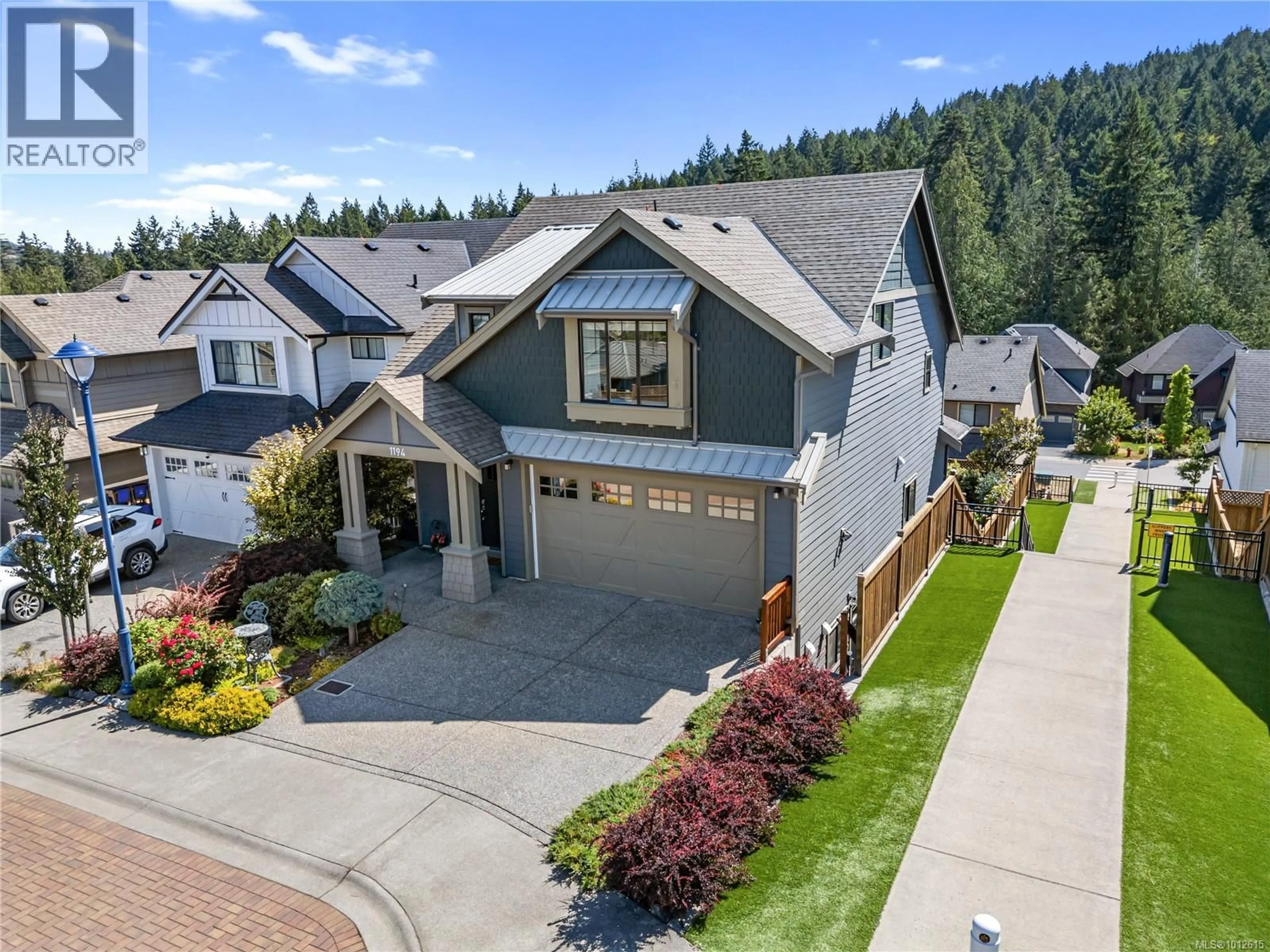 A pic from outside/outdoor area/front of a property/back of a property/a pic from drone, mountain view for 1194 BOMBARDIER CRESCENT, Langford British Columbia V9B0R2