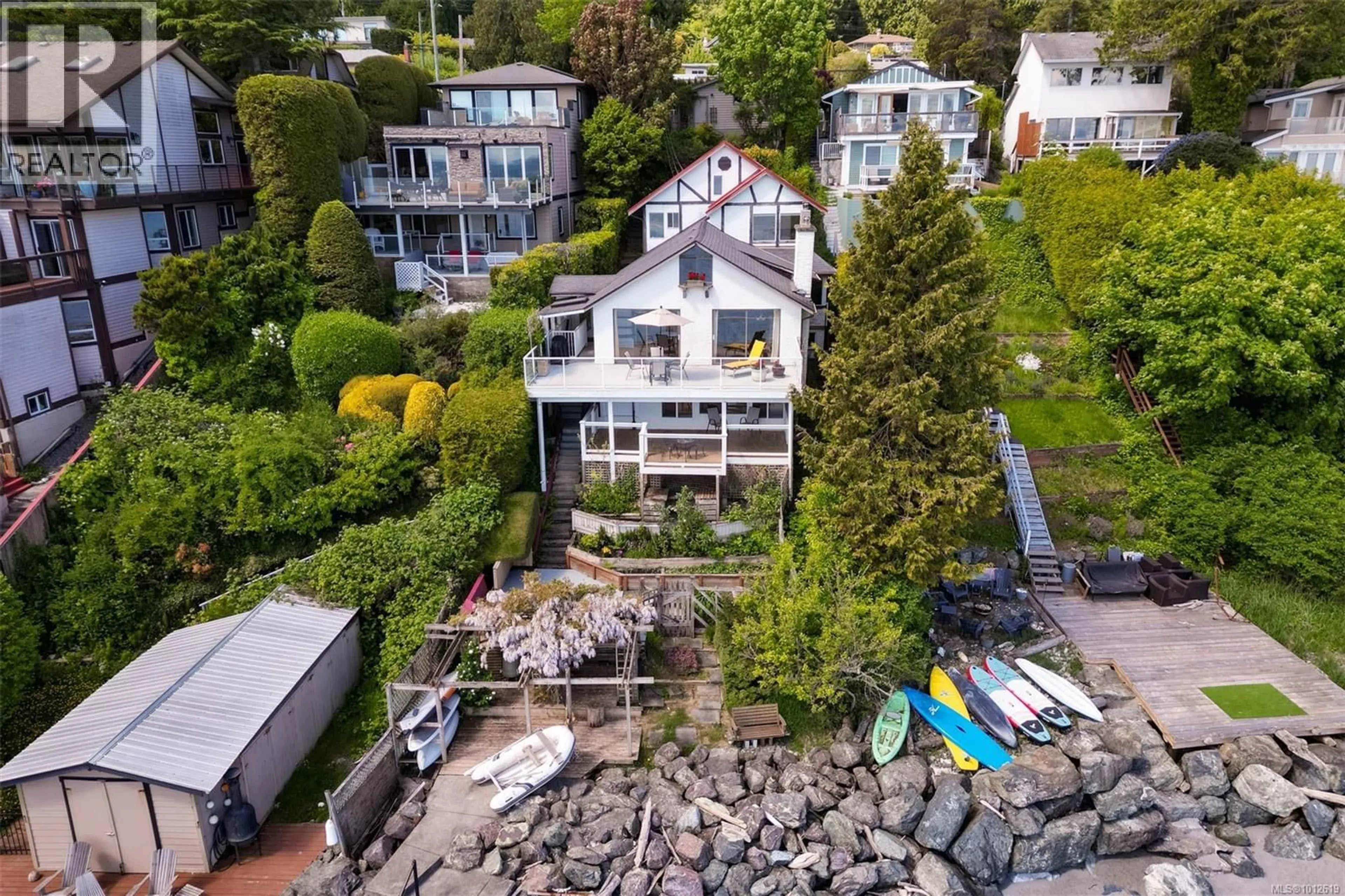 A pic from outside/outdoor area/front of a property/back of a property/a pic from drone, water/lake/river/ocean view for 4955 CORDOVA BAY ROAD, Saanich British Columbia V8Y2K1