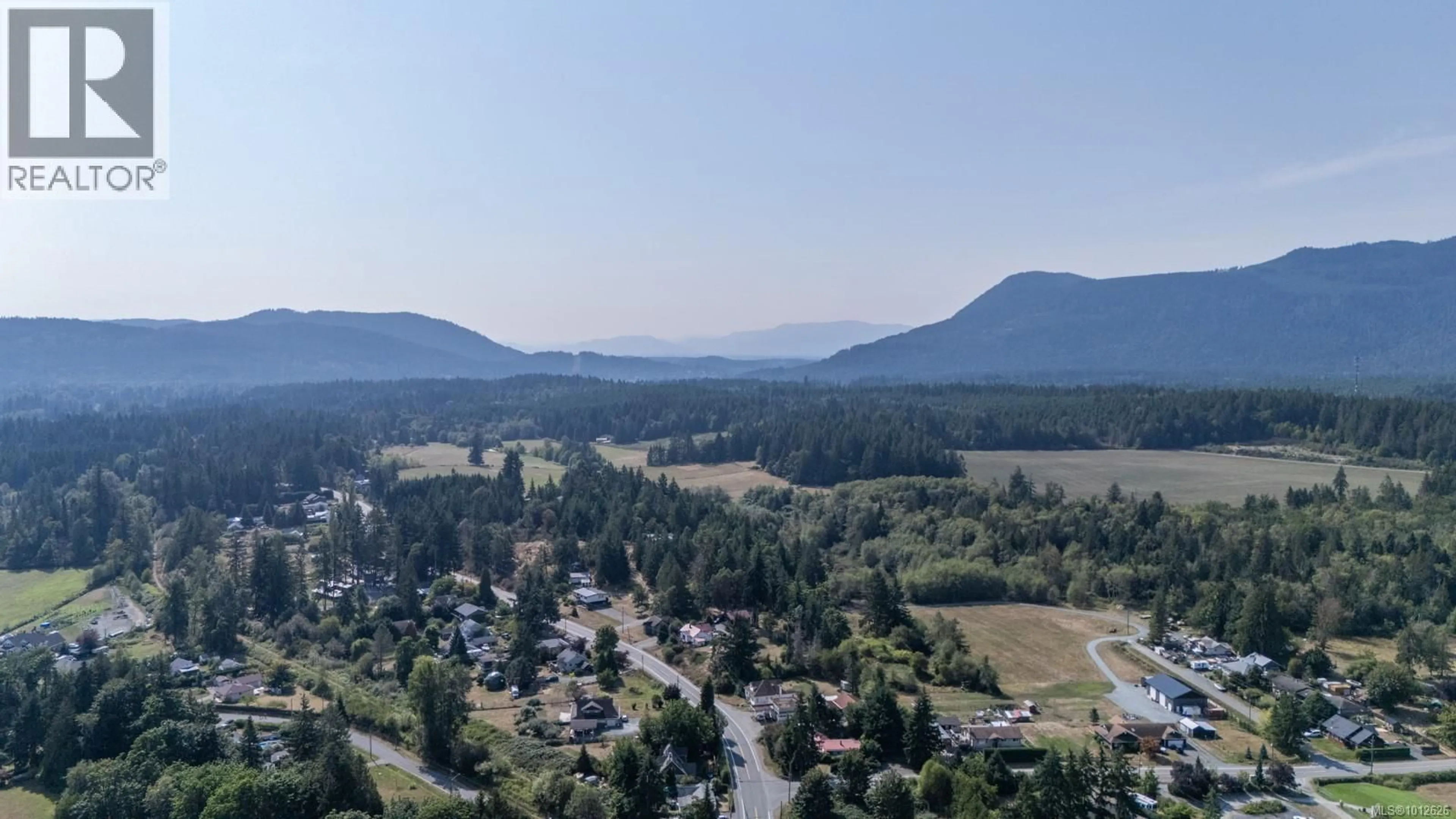 A pic from outside/outdoor area/front of a property/back of a property/a pic from drone, mountain view for 9387 CHEMAINUS ROAD, Chemainus British Columbia V0R1K5