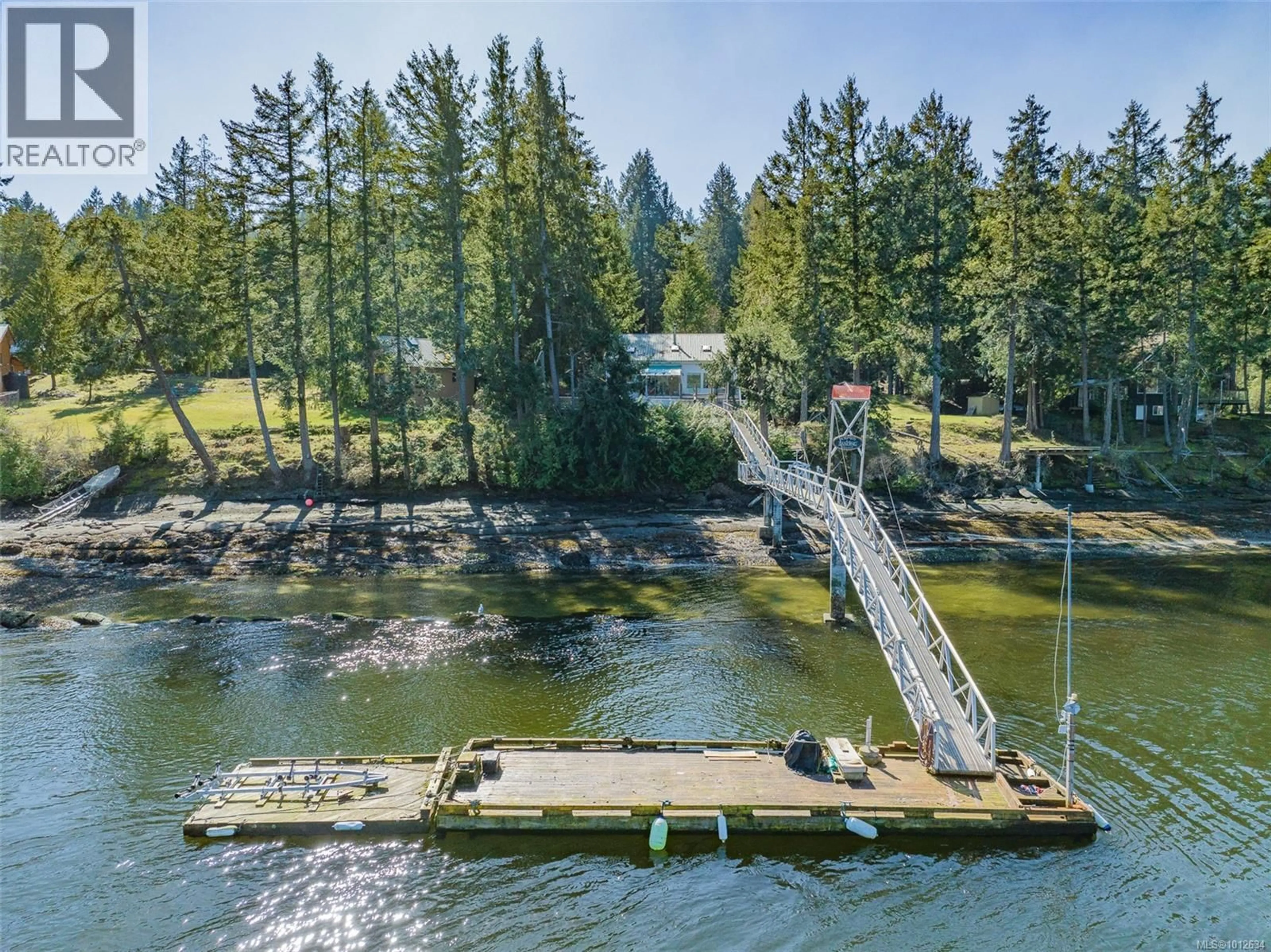 A pic from outside/outdoor area/front of a property/back of a property/a pic from drone, water/lake/river/ocean view for 558 WEATHERS WAY, Mudge Island British Columbia V0R1X6