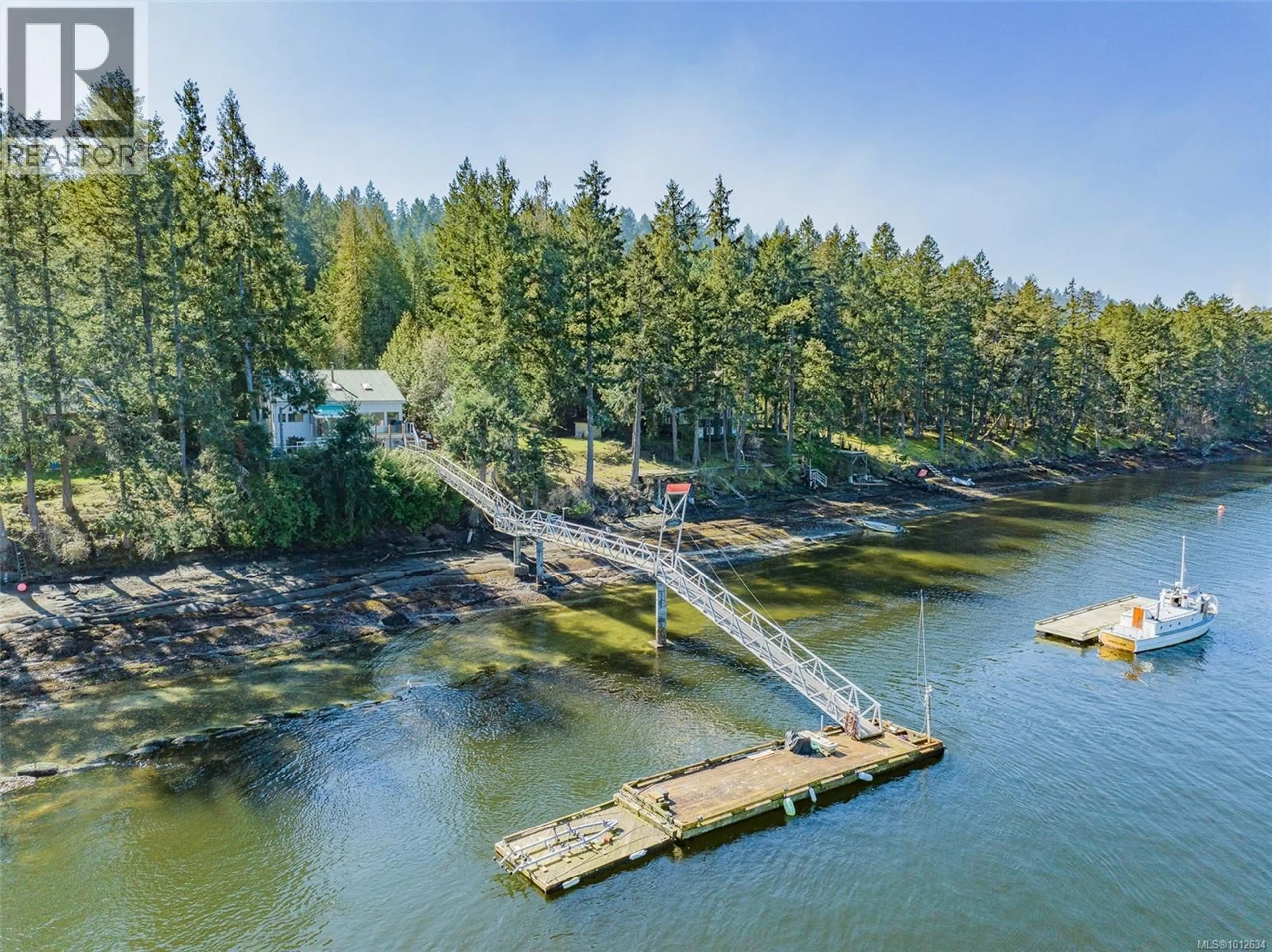 A pic from outside/outdoor area/front of a property/back of a property/a pic from drone, water/lake/river/ocean view for 558 WEATHERS WAY, Mudge Island British Columbia V0R1X6
