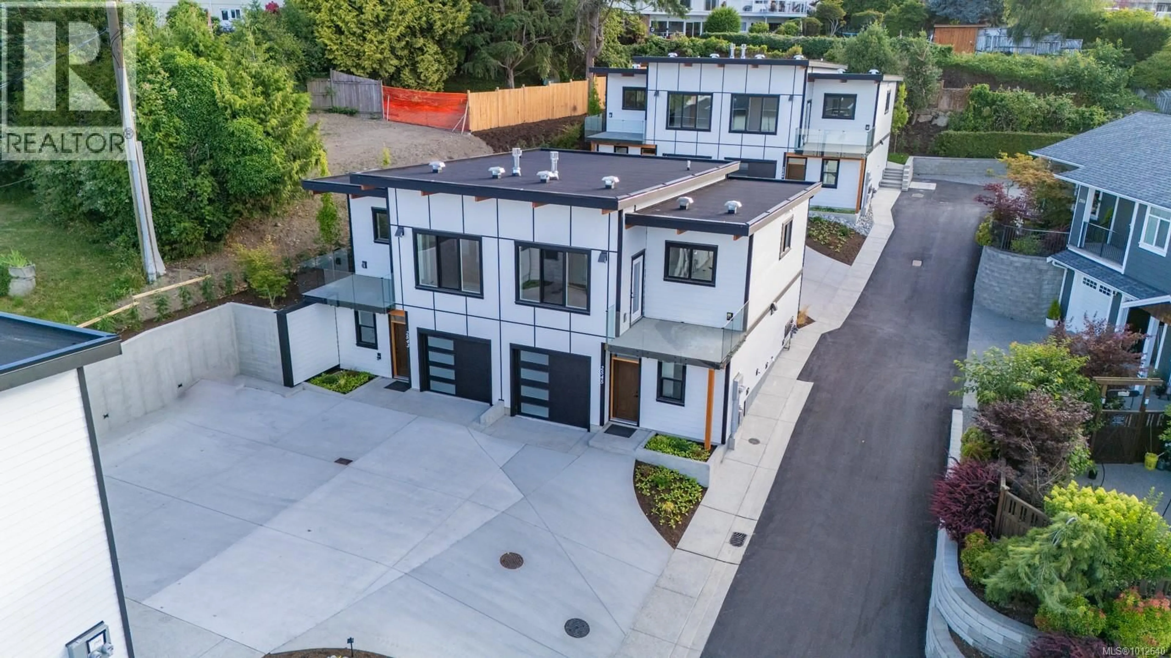 A pic from outside/outdoor area/front of a property/back of a property/a pic from drone, street for 2543 DOCTORS ROAD, Nanaimo British Columbia V9S3V4