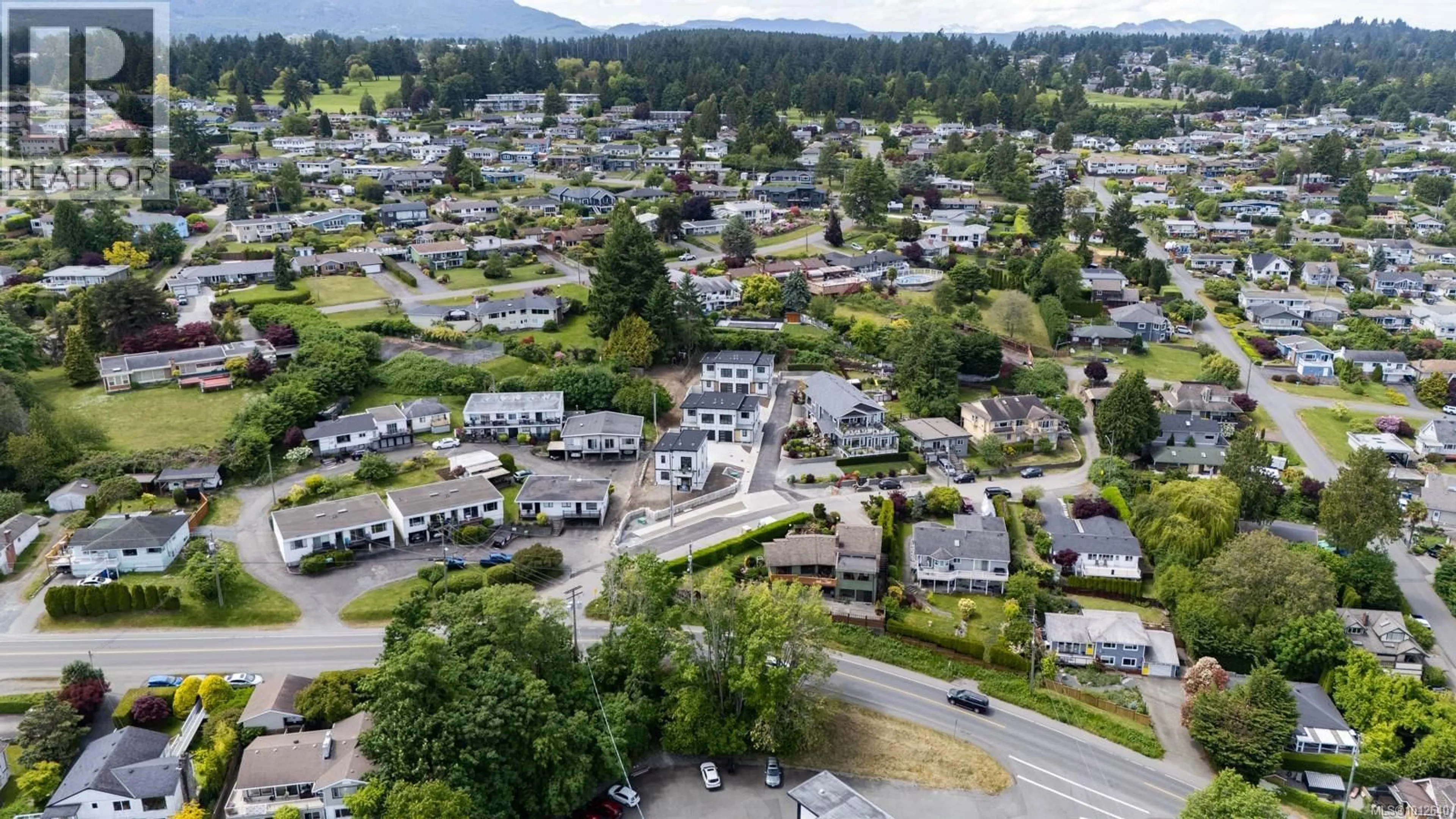 A pic from outside/outdoor area/front of a property/back of a property/a pic from drone, mountain view for 2543 DOCTORS ROAD, Nanaimo British Columbia V9S3V4