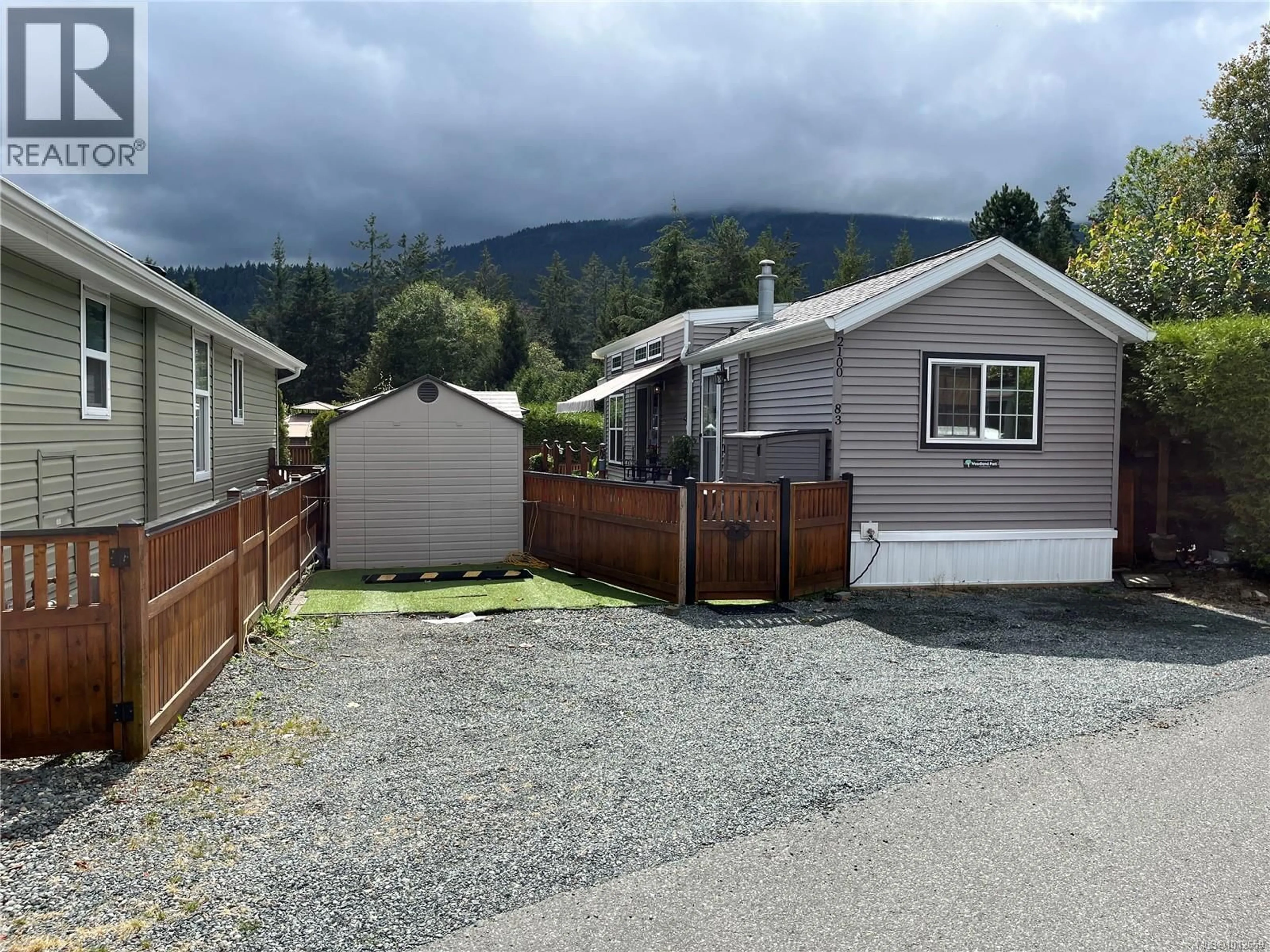 A pic from outside/outdoor area/front of a property/back of a property/a pic from drone, mountain view for 83 - 2100 HENDERSON LAKE ROAD, Nanaimo British Columbia V9R6X7