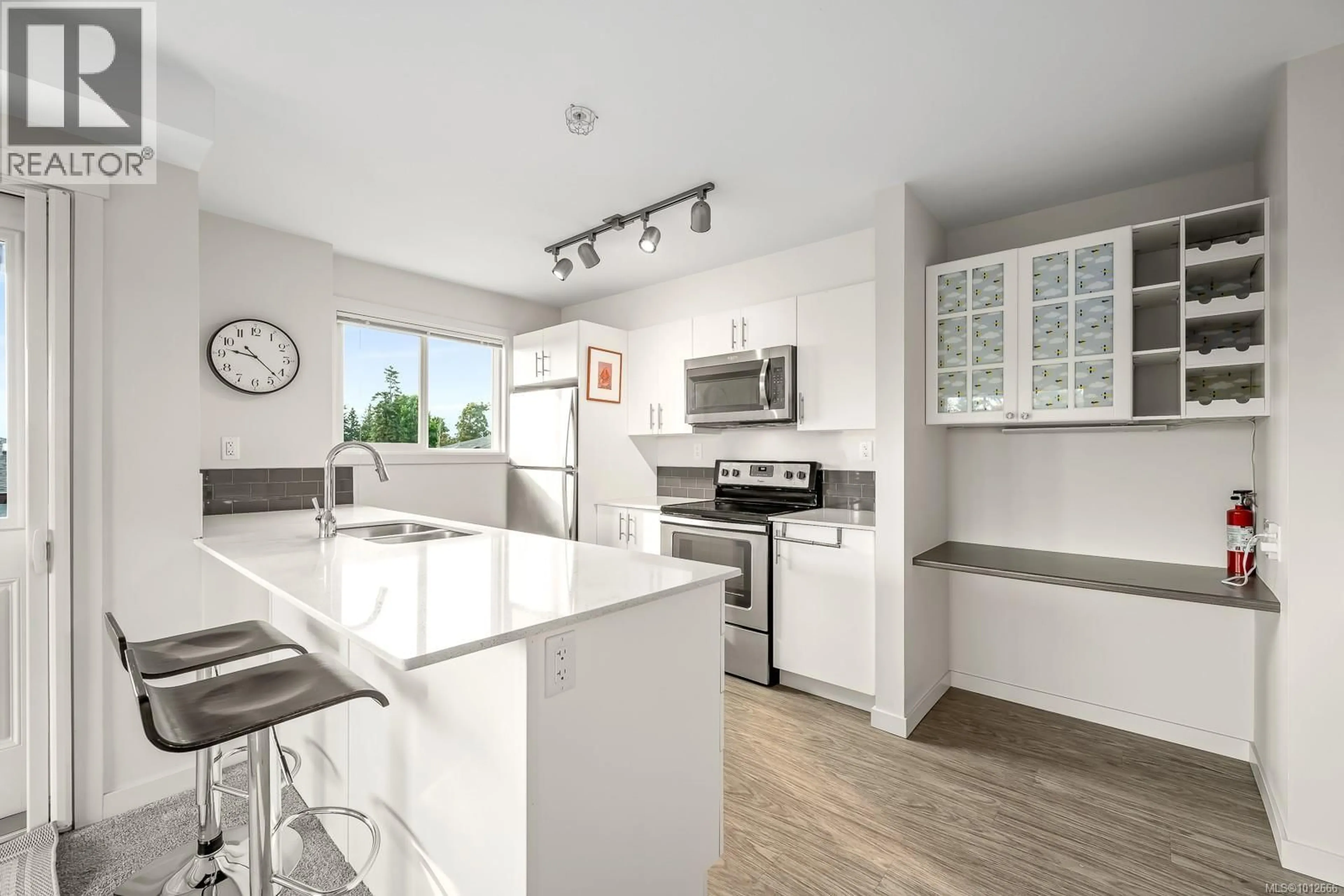 Open concept kitchen, unknown for 411 - 1944 RIVERSIDE LANE, Courtenay British Columbia V9N0E5