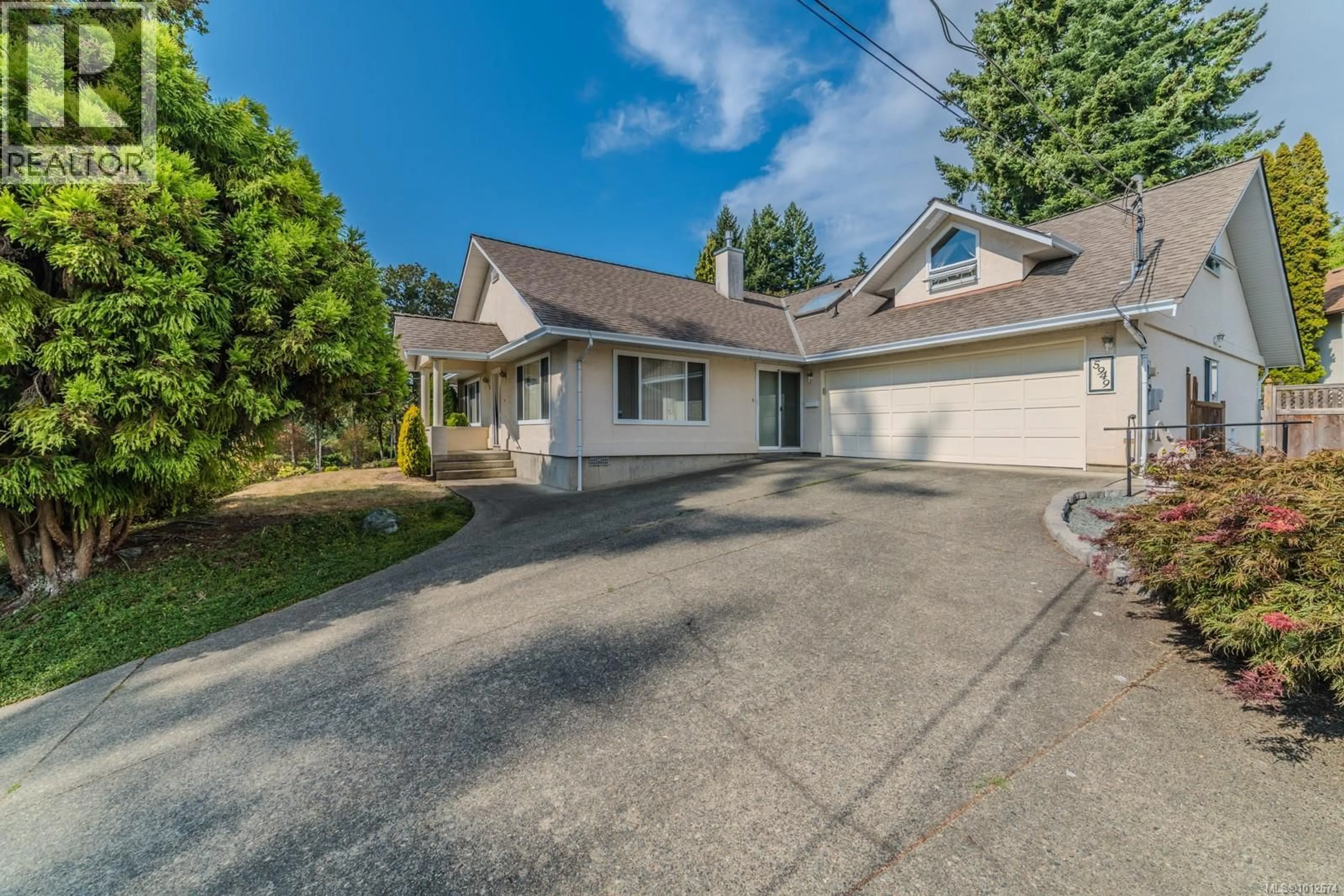 A pic from outside/outdoor area/front of a property/back of a property/a pic from drone, street for 5949 JAYNES ROAD, Duncan British Columbia V9L3C4