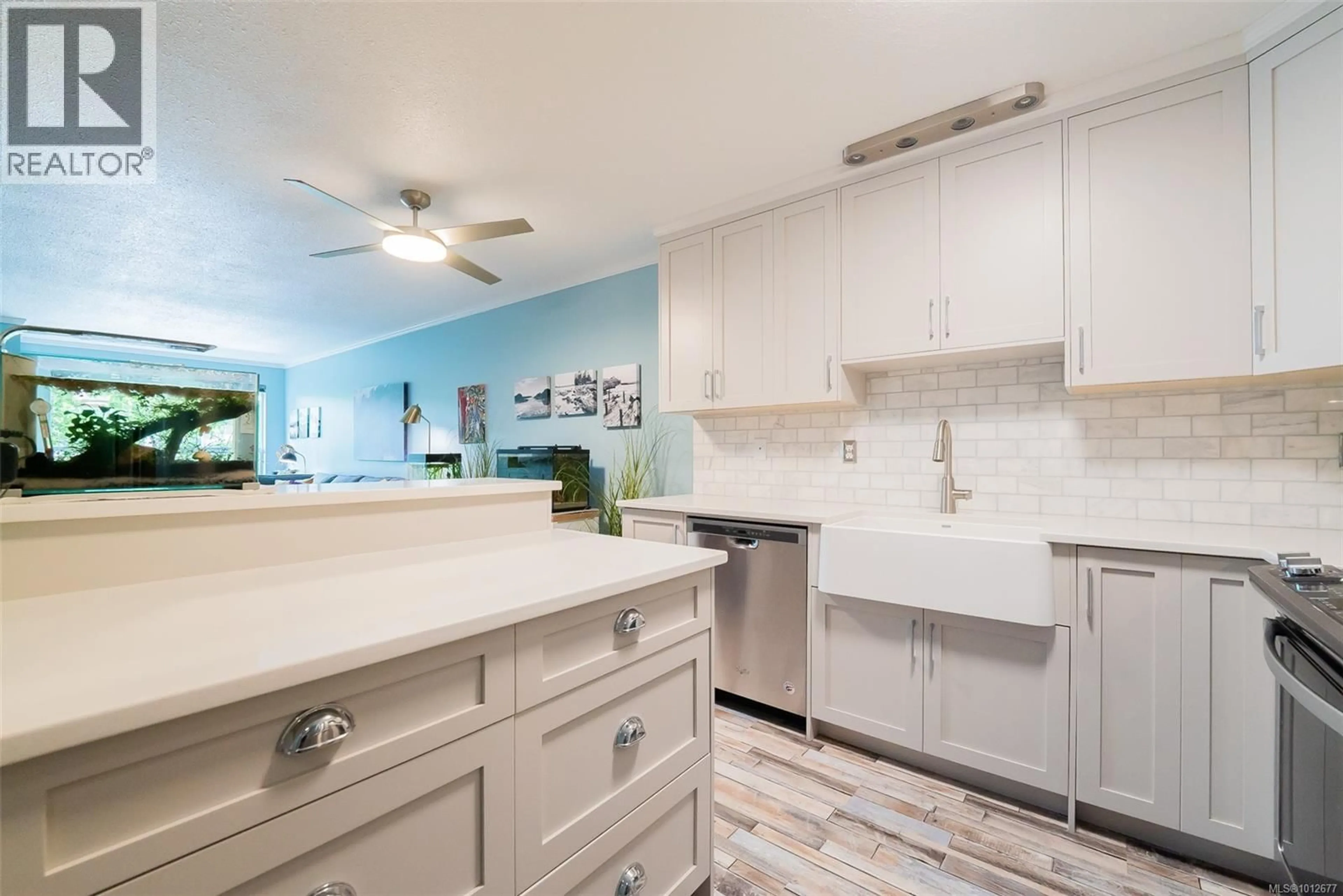 Open concept kitchen, ceramic/tile floor for 205 - 100 DAWES STREET, Nanaimo British Columbia V9S1A3