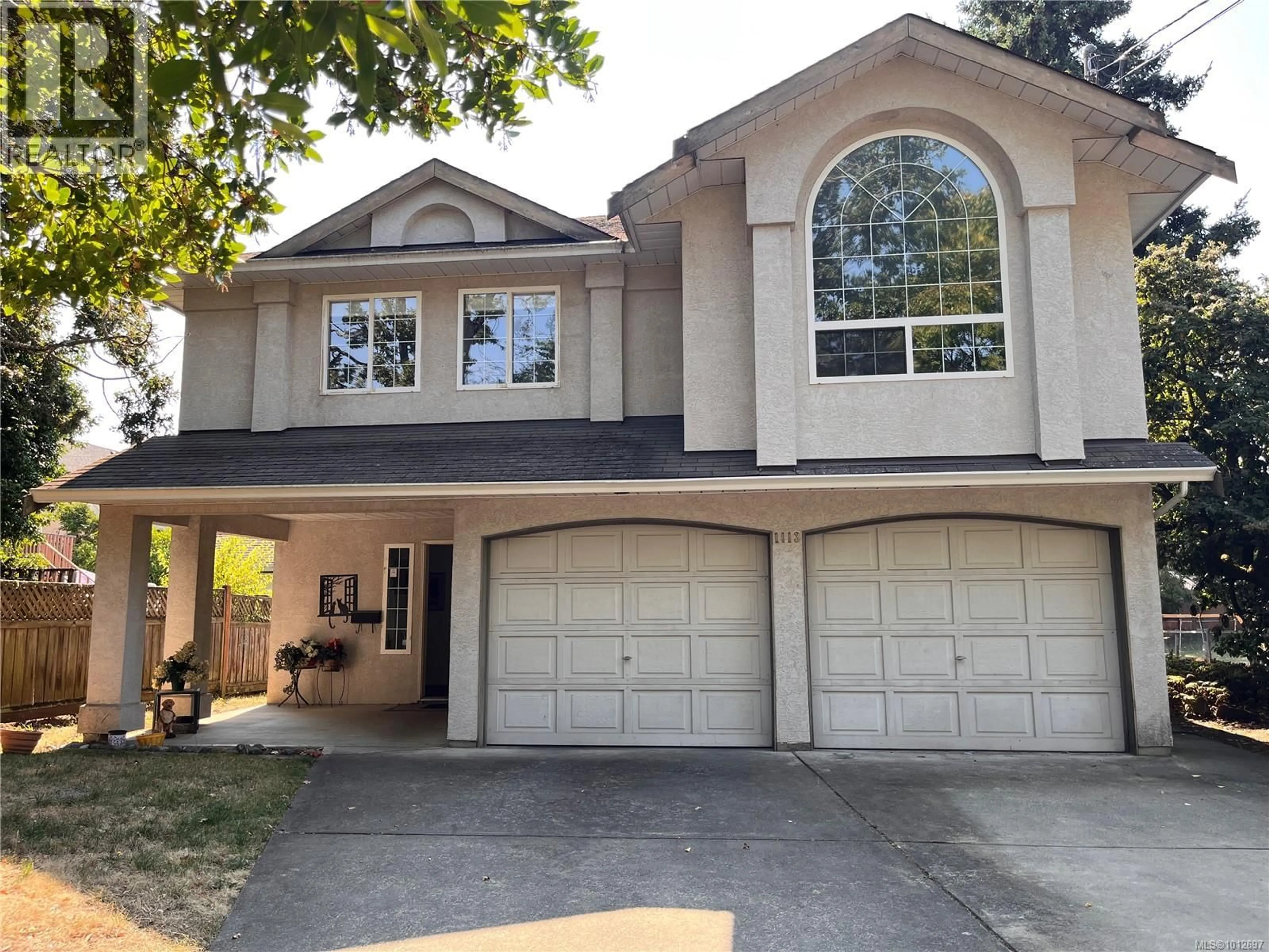 Home with vinyl exterior material, street for 1113 ROCK STREET, Saanich British Columbia V8P2B9