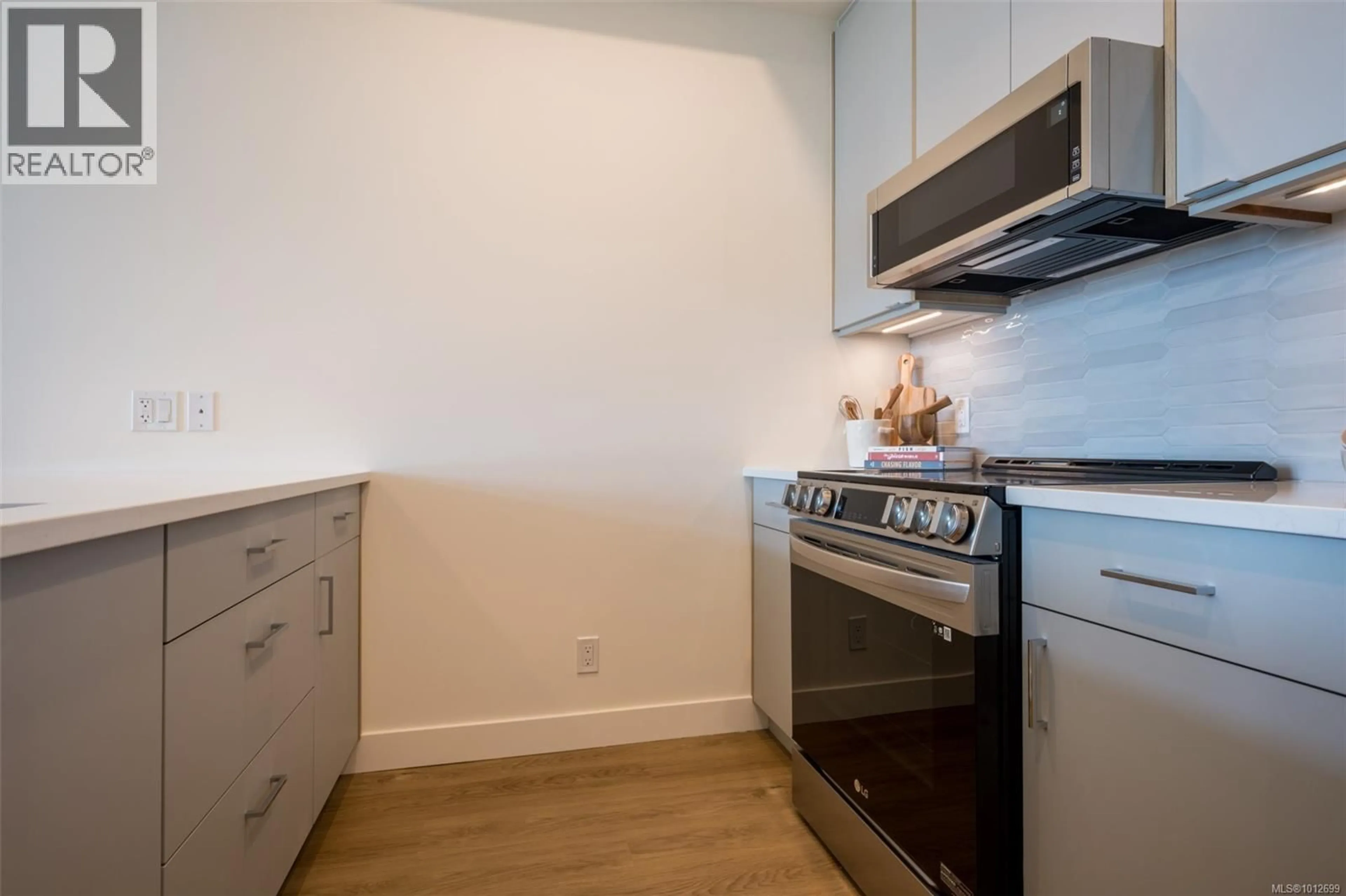Standard kitchen, wood/laminate floor for 402 - 757 TYEE ROAD, Victoria British Columbia V9A7P7