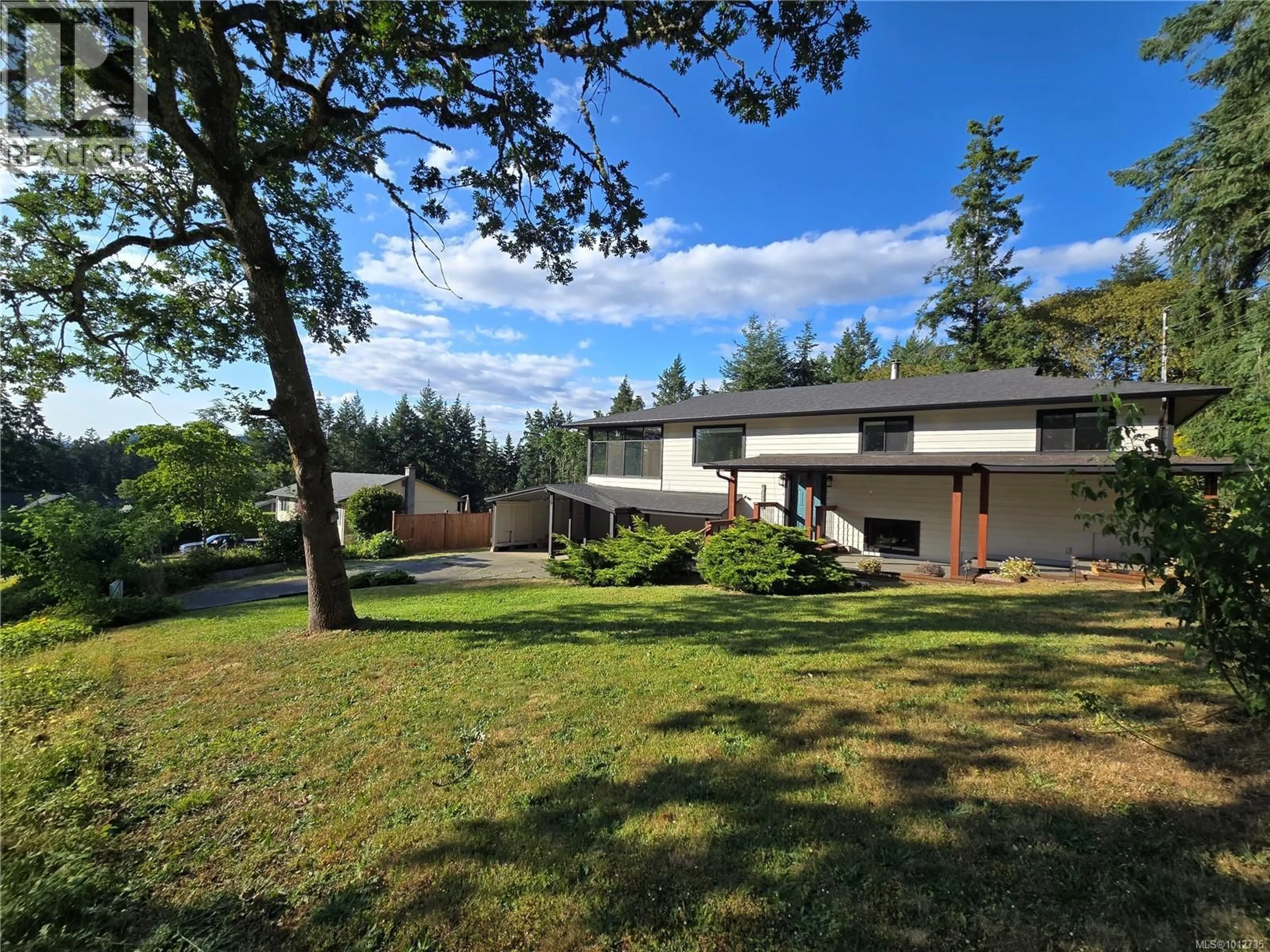 A pic from outside/outdoor area/front of a property/back of a property/a pic from drone, forest/trees view for 6315 WOODGROVE WAY, Duncan British Columbia V9L5R4