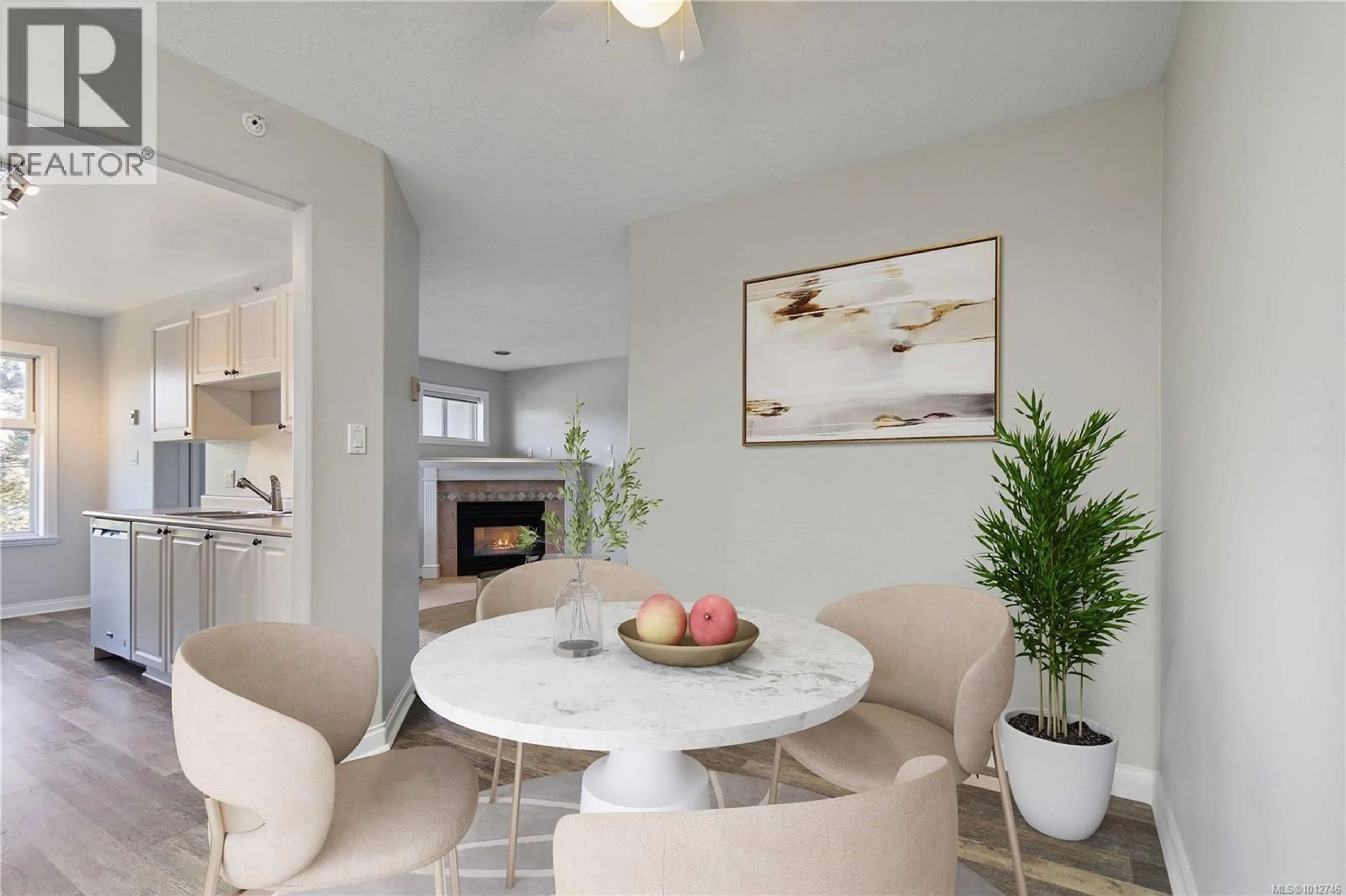 Living room with furniture, ceramic/tile floor for 406 - 1580 CHRISTMAS AVENUE, Saanich British Columbia V8P2X2