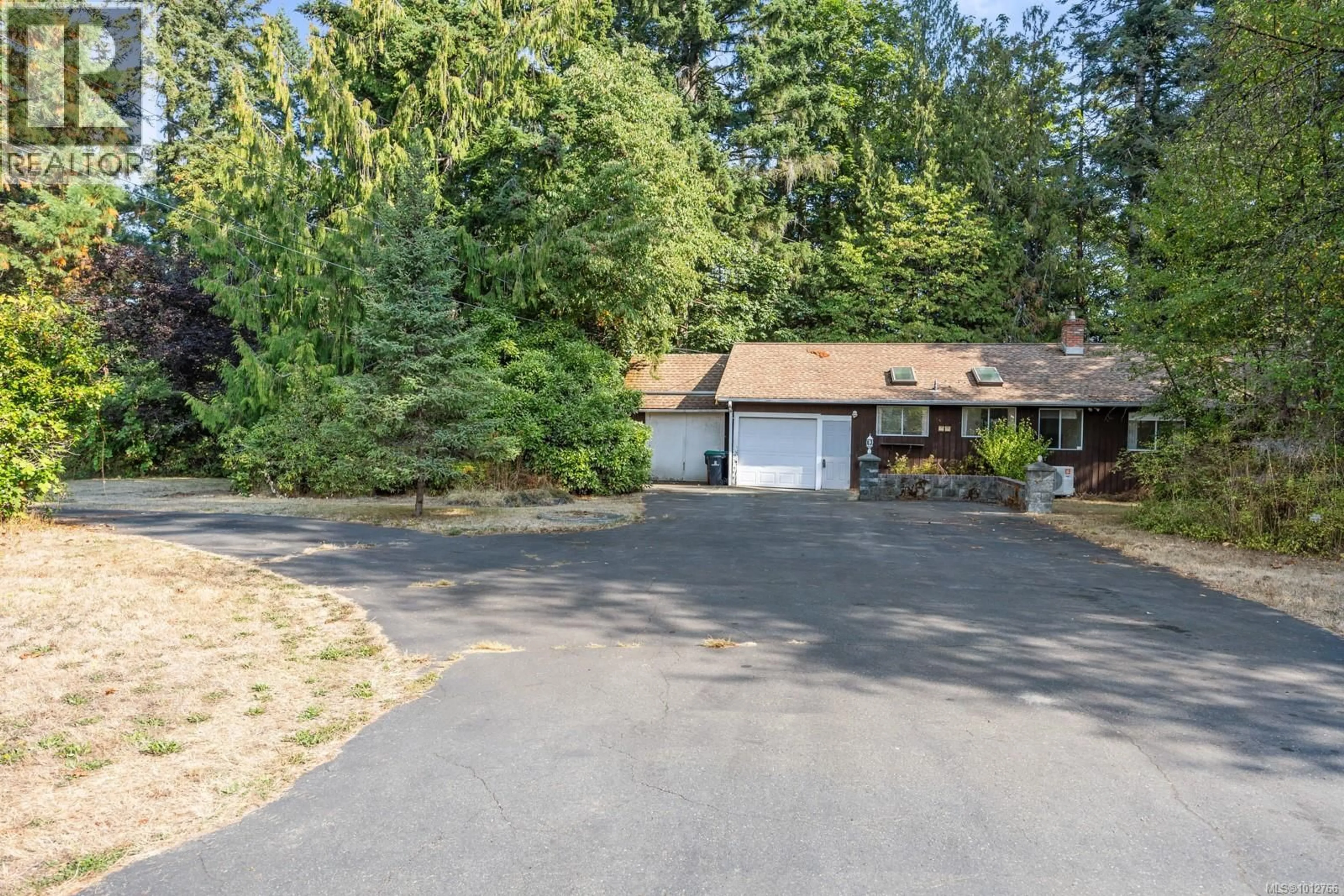A pic from outside/outdoor area/front of a property/back of a property/a pic from drone, unknown for 3264 LOCKWELL ROAD, Courtenay British Columbia V9N9P4