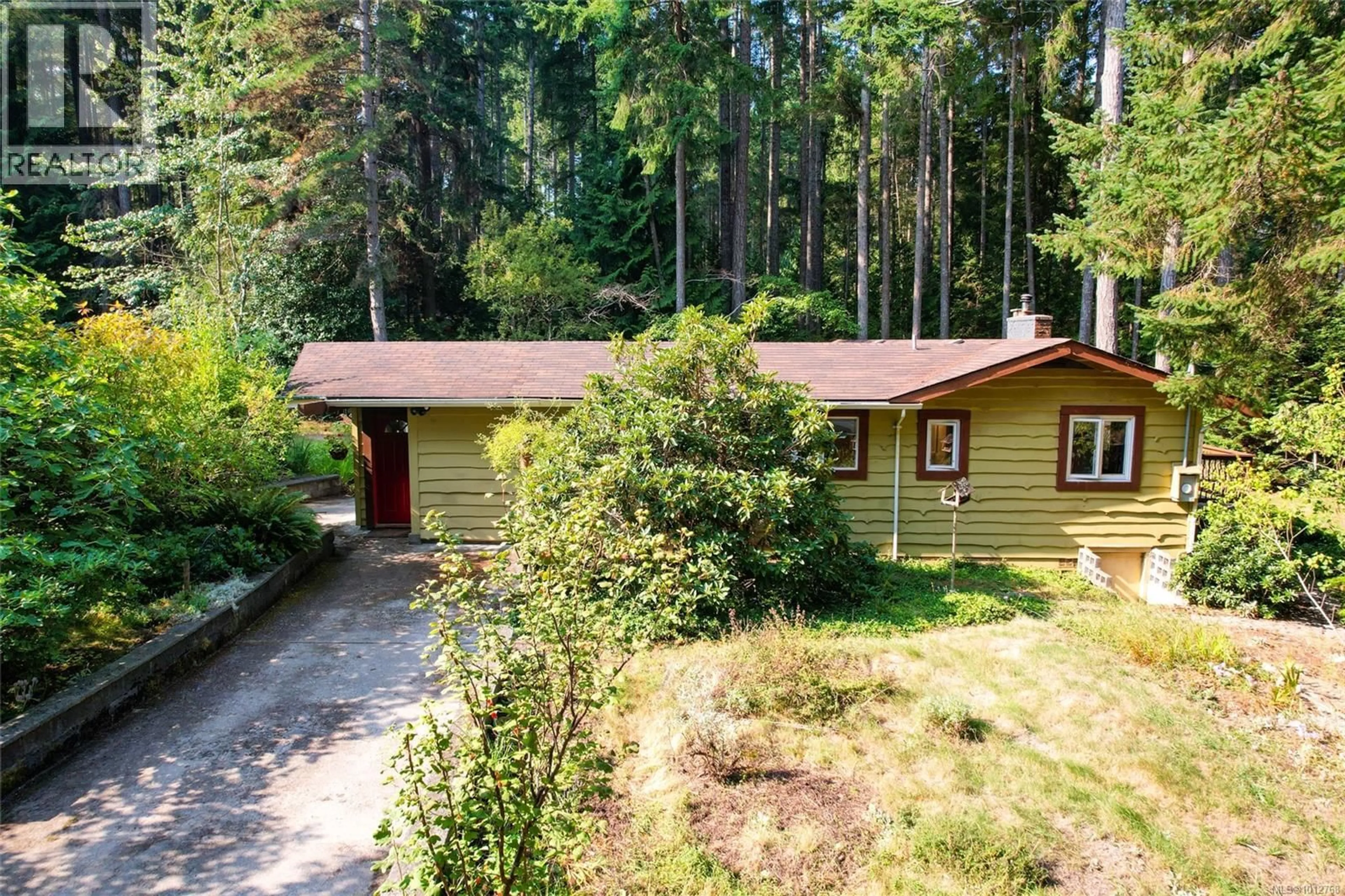 A pic from outside/outdoor area/front of a property/back of a property/a pic from drone, forest/trees view for 451 BERRY POINT ROAD, Gabriola Island British Columbia V0R1X1