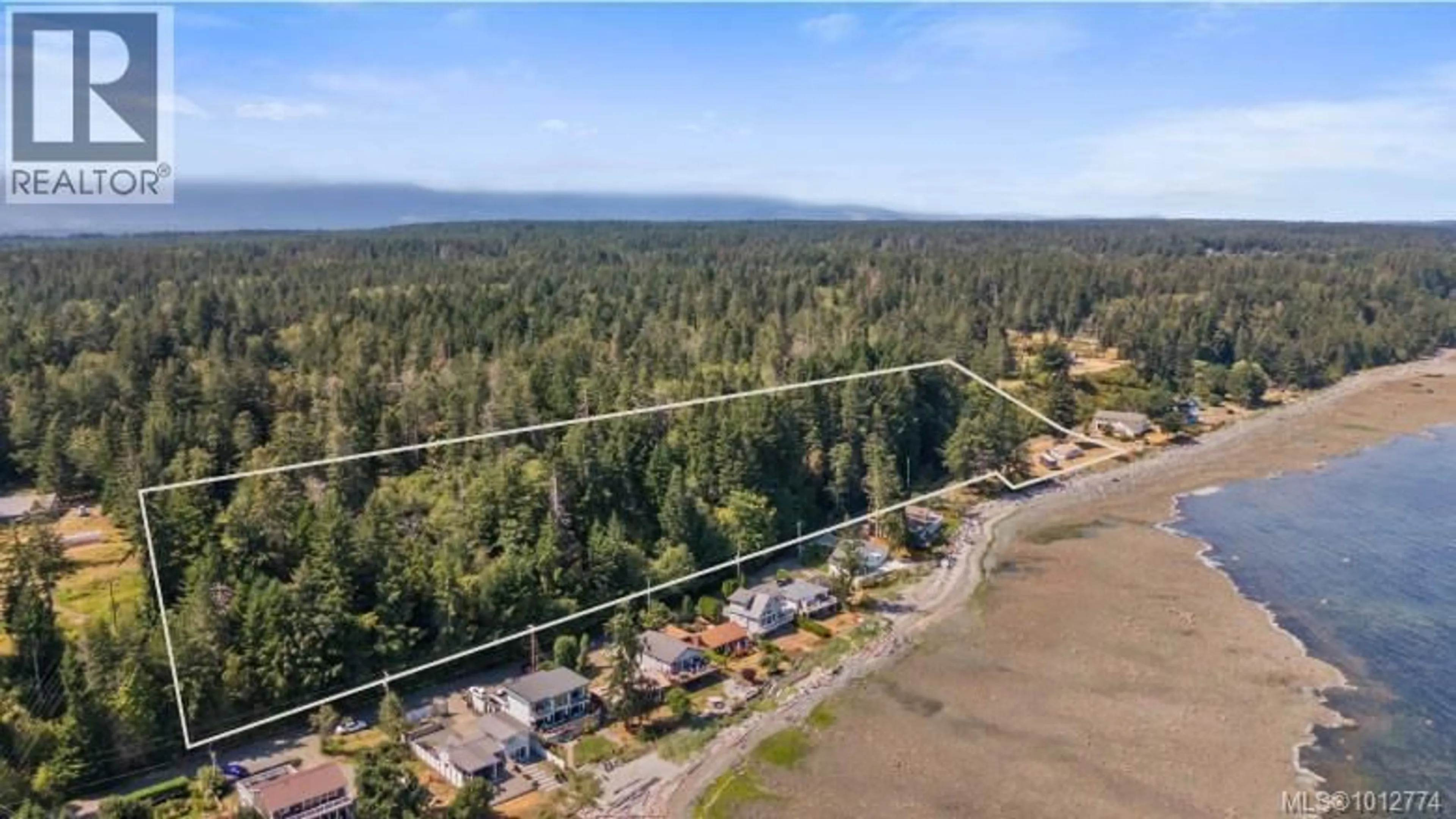 A pic from outside/outdoor area/front of a property/back of a property/a pic from drone, water/lake/river/ocean view for 1494 WILKINSON ROAD, Comox British Columbia V9M4B3