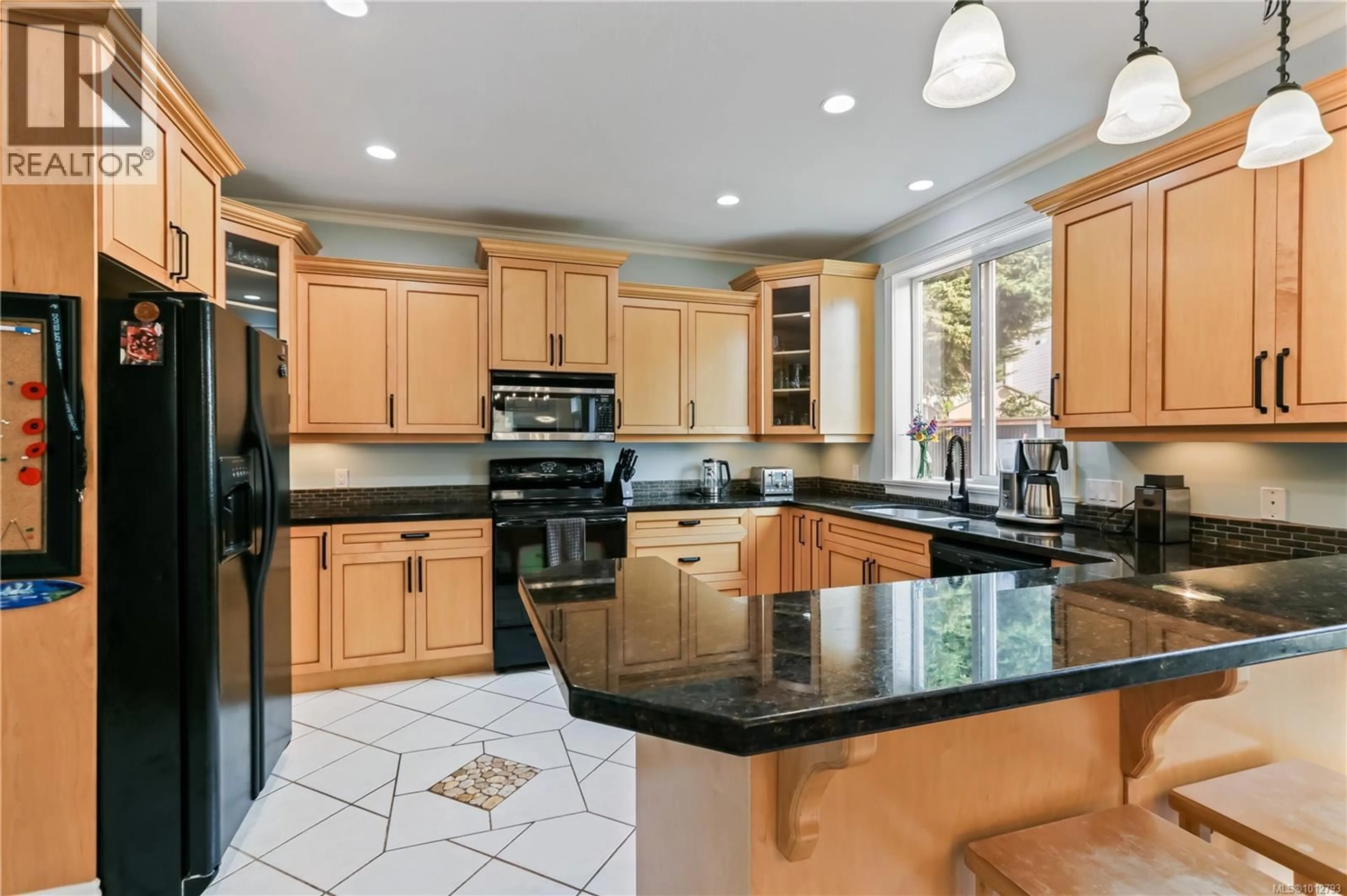 Open concept kitchen, ceramic/tile floor for 6106 MONTGOMERY WAY, Nanaimo British Columbia V9V1T5