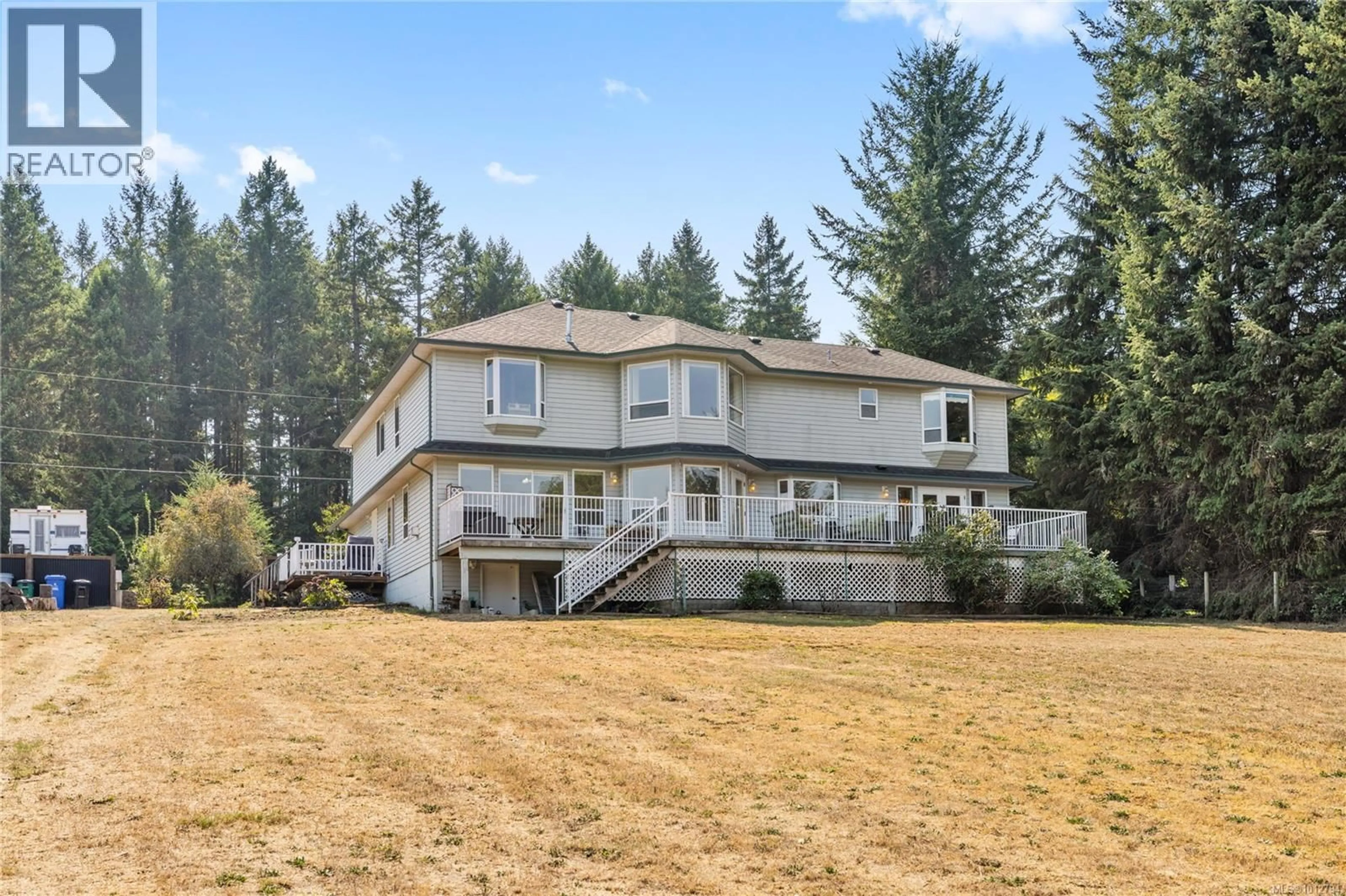 A pic from outside/outdoor area/front of a property/back of a property/a pic from drone, mountain view for 5145 GROUHEL ROAD, Ladysmith British Columbia V9G1J4