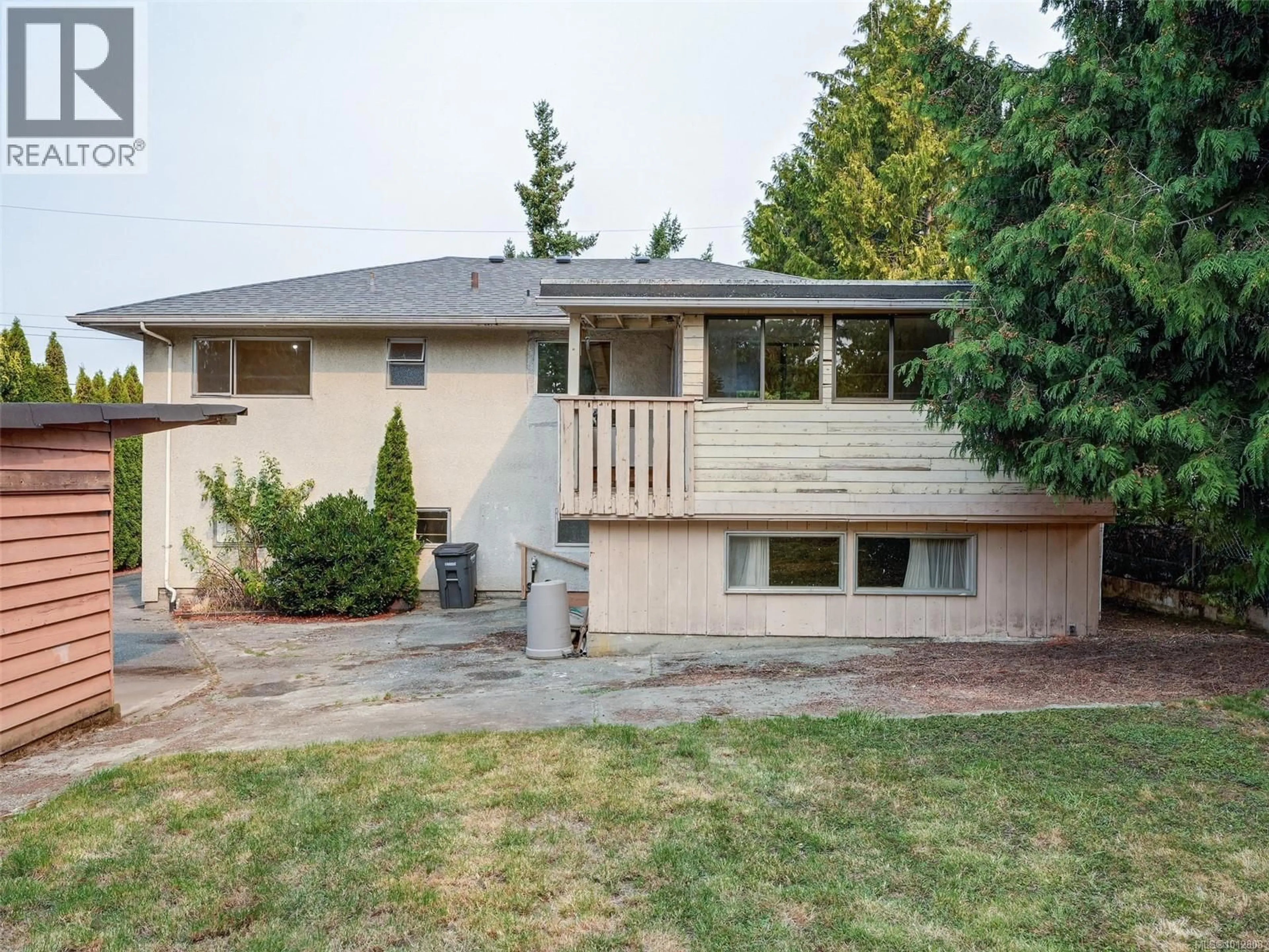 Home with vinyl exterior material, street for 723 GENEVIEVE ROAD, Saanich British Columbia V8X3R5