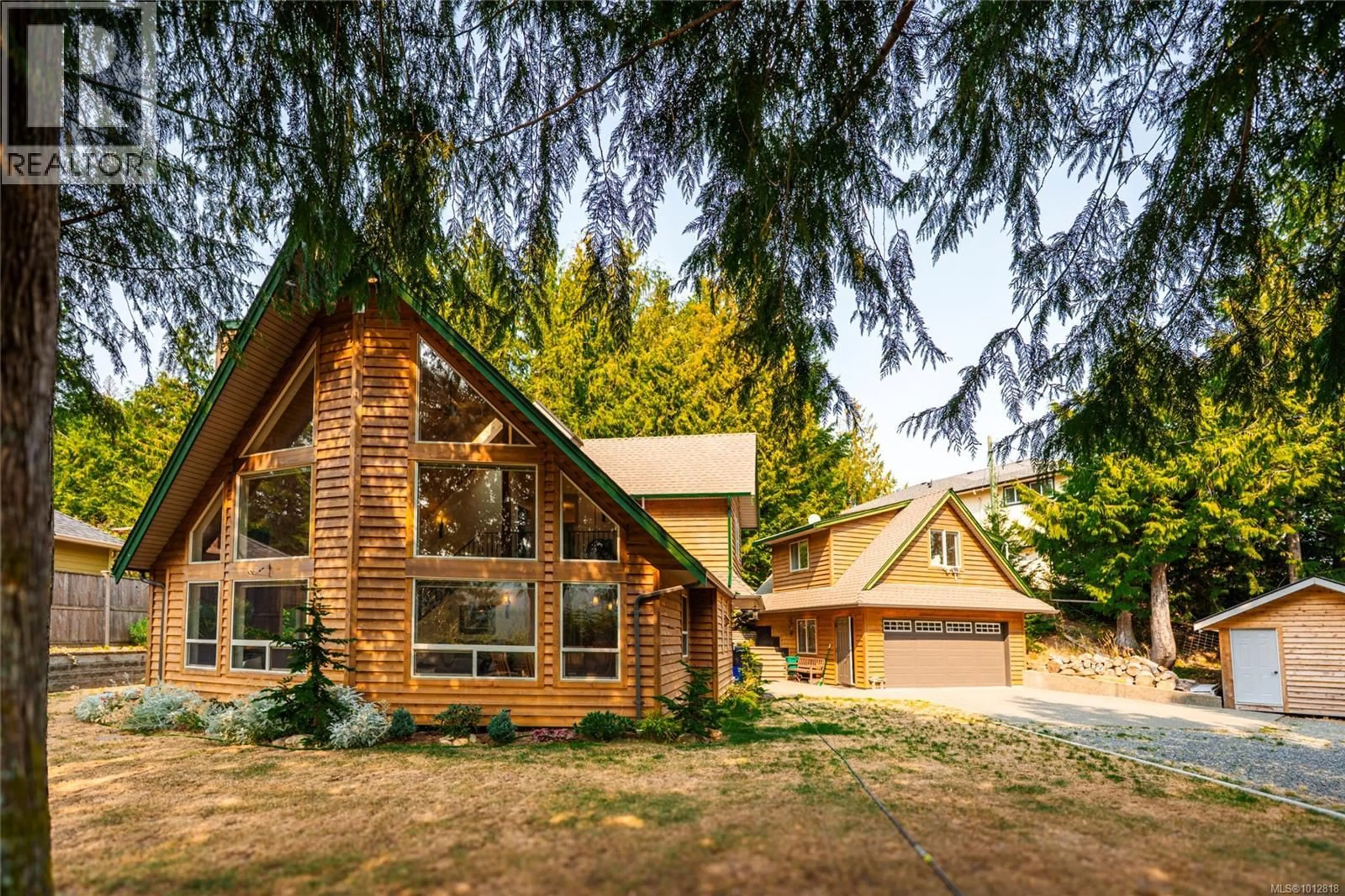 Home with vinyl exterior material, mountain view for 1751 MARTINI WAY, Qualicum Beach British Columbia V9K2S3