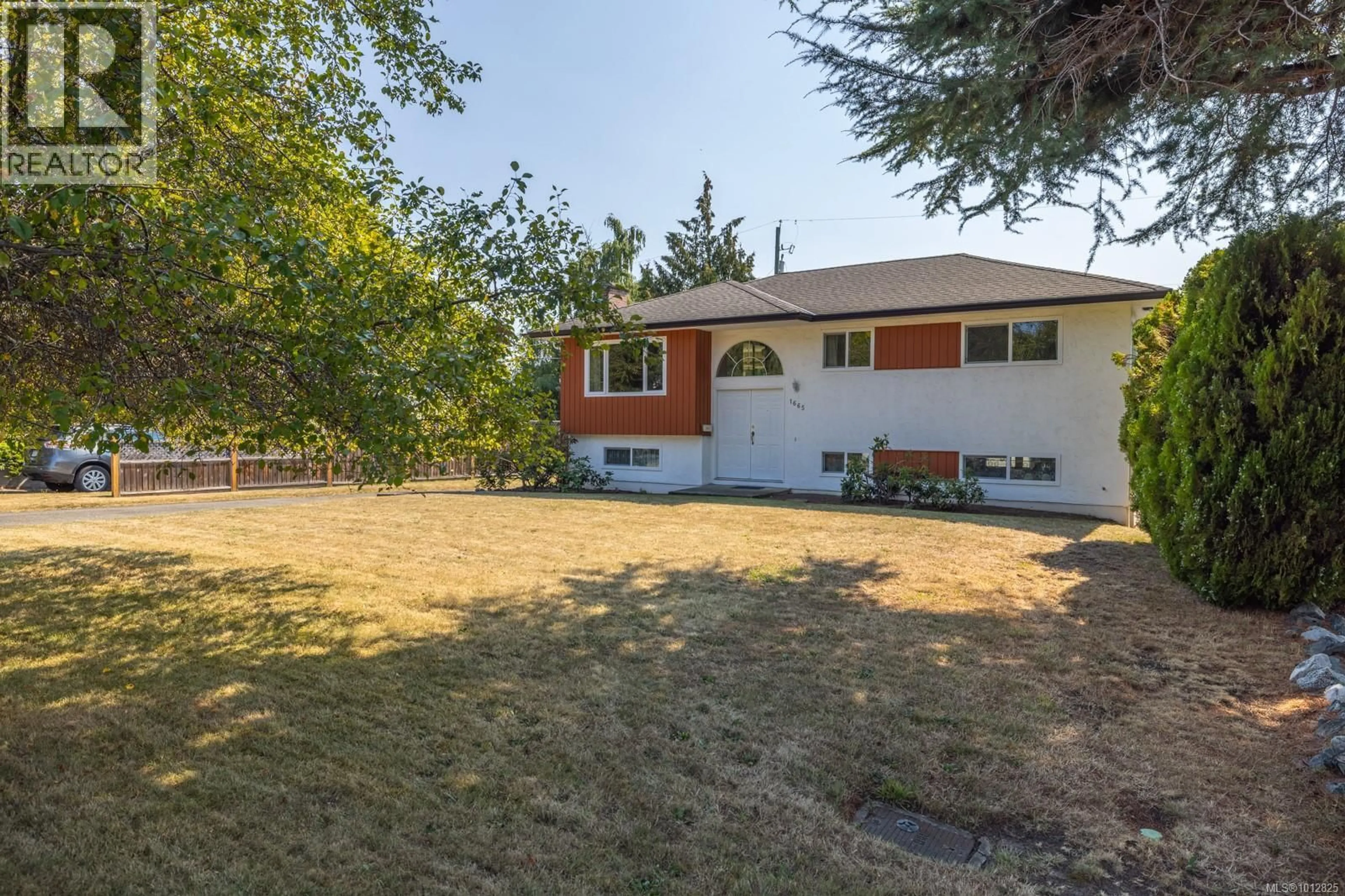 A pic from outside/outdoor area/front of a property/back of a property/a pic from drone, street for 1665 BLAIR AVENUE, Saanich British Columbia V8N1M6