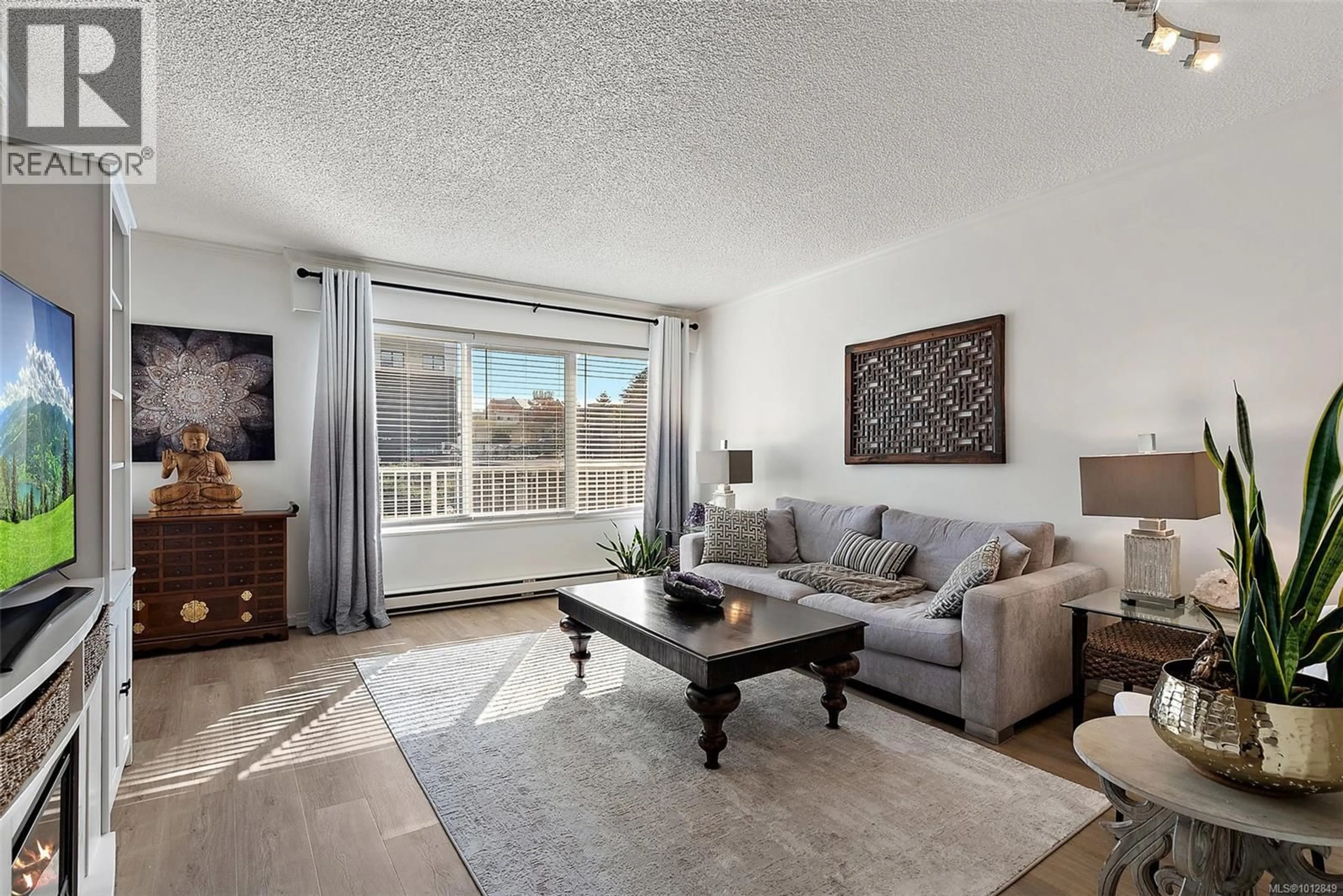 Living room with furniture, unknown for 302 - 642 ADMIRALS ROAD, Esquimalt British Columbia V9A2N7