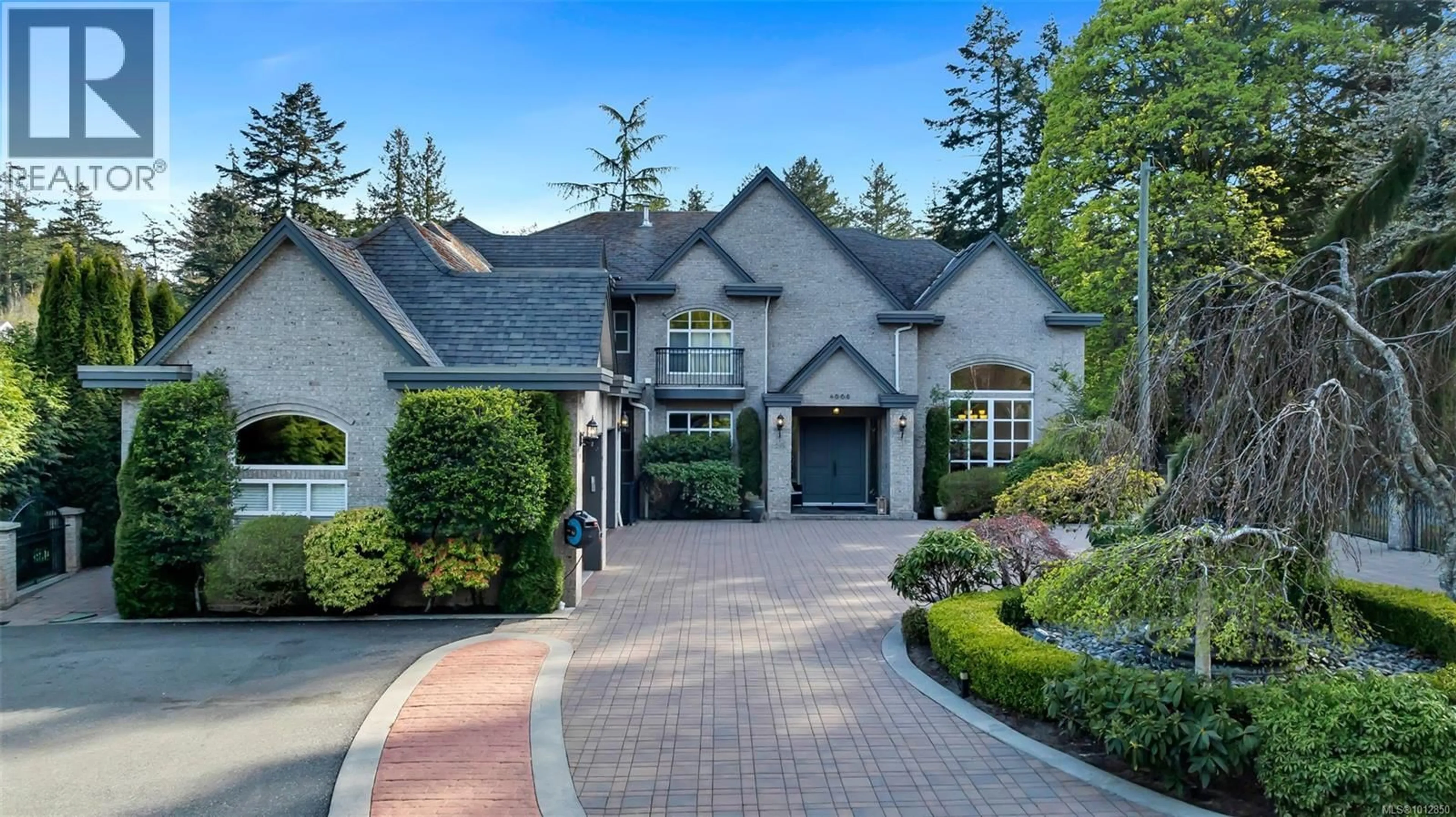 Home with brick exterior material, street for 4668 CORDOVA BAY ROAD, Saanich British Columbia V8X3V7