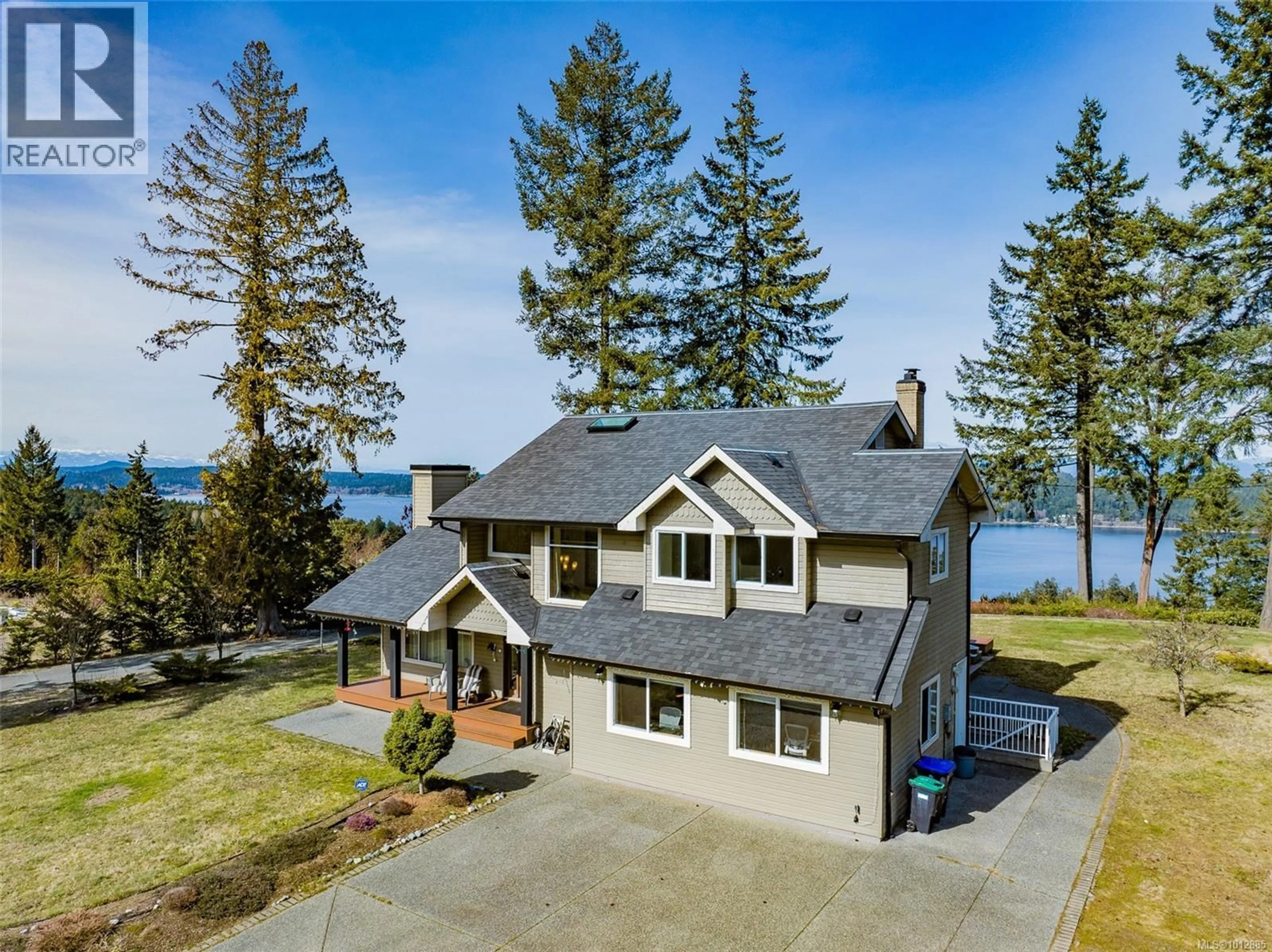 A pic from outside/outdoor area/front of a property/back of a property/a pic from drone, water/lake/river/ocean view for 8225 SOUTHWIND DRIVE, Lantzville British Columbia V0R2H0