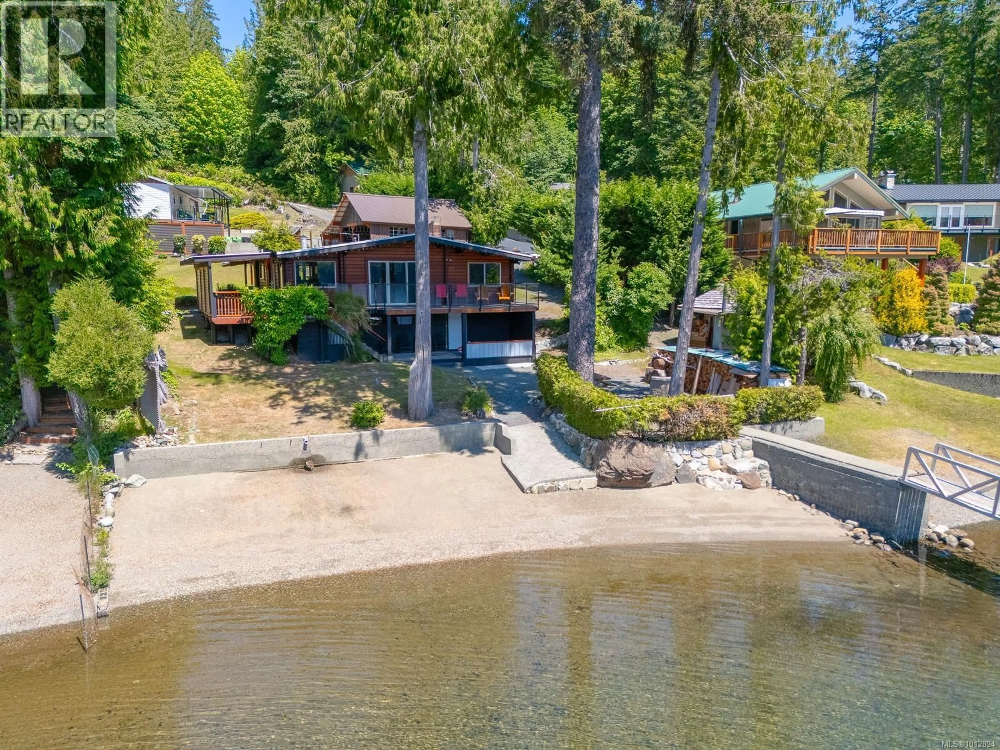 A pic from outside/outdoor area/front of a property/back of a property/a pic from drone, water/lake/river/ocean view for 8856 STIRLING ARM DRIVE, Port Alberni British Columbia V9Y9E1