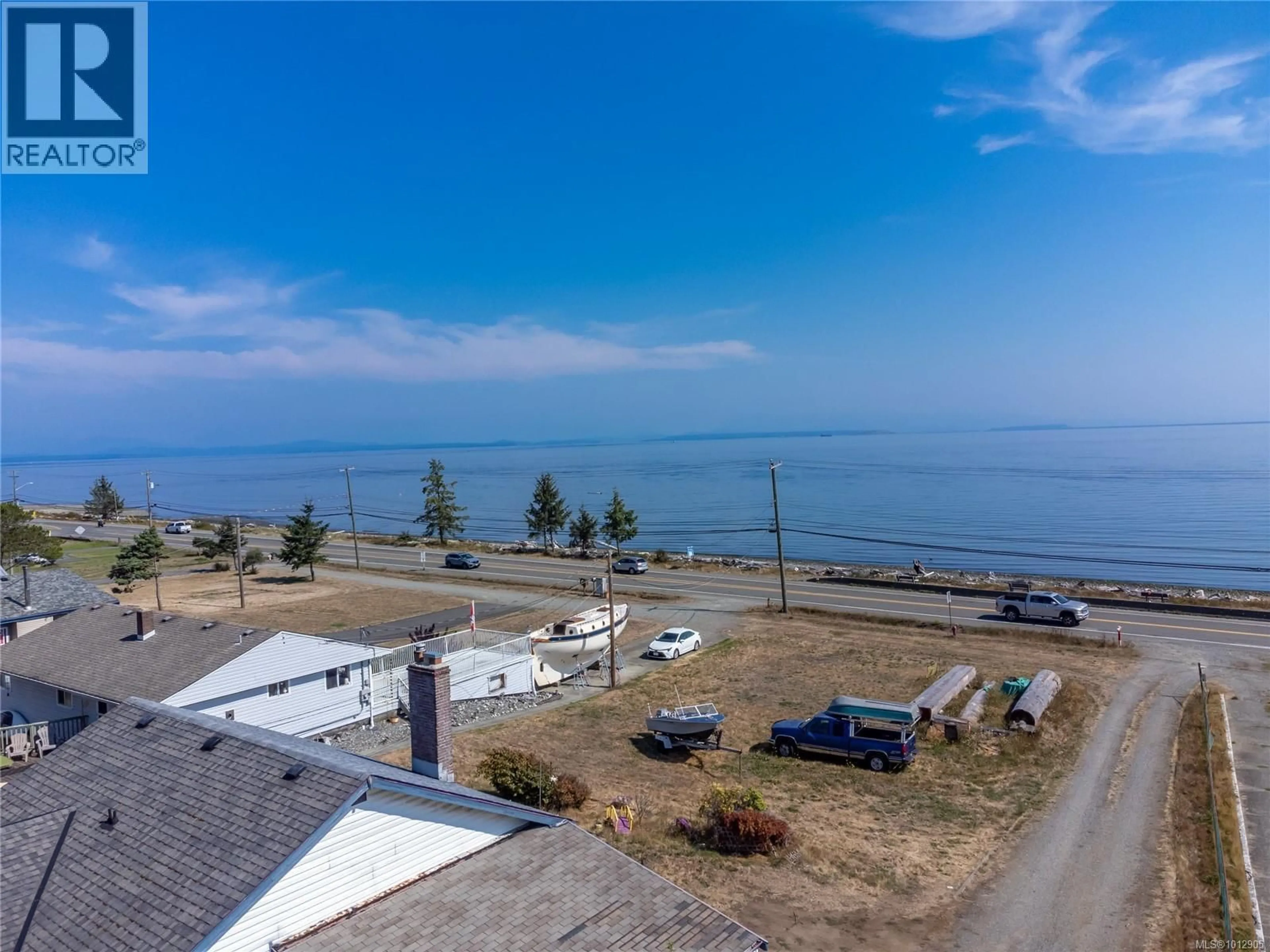 A pic from outside/outdoor area/front of a property/back of a property/a pic from drone, water/lake/river/ocean view for 3956 ISLAND HIGHWAY SOUTH, Campbell River British Columbia V9H1M9