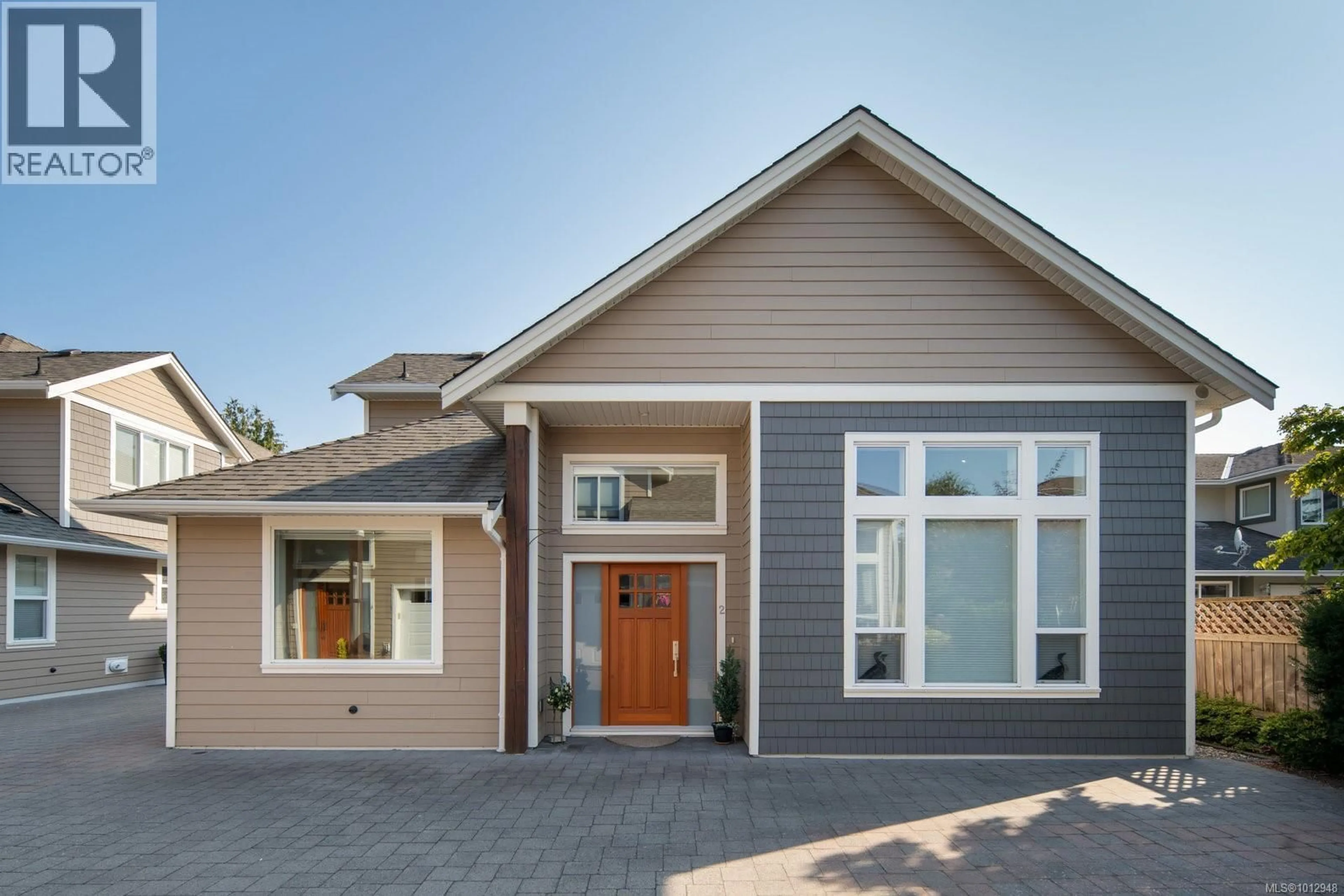 Home with vinyl exterior material, street for 2 - 2430 HENRY AVENUE, Sidney British Columbia V8L2B7
