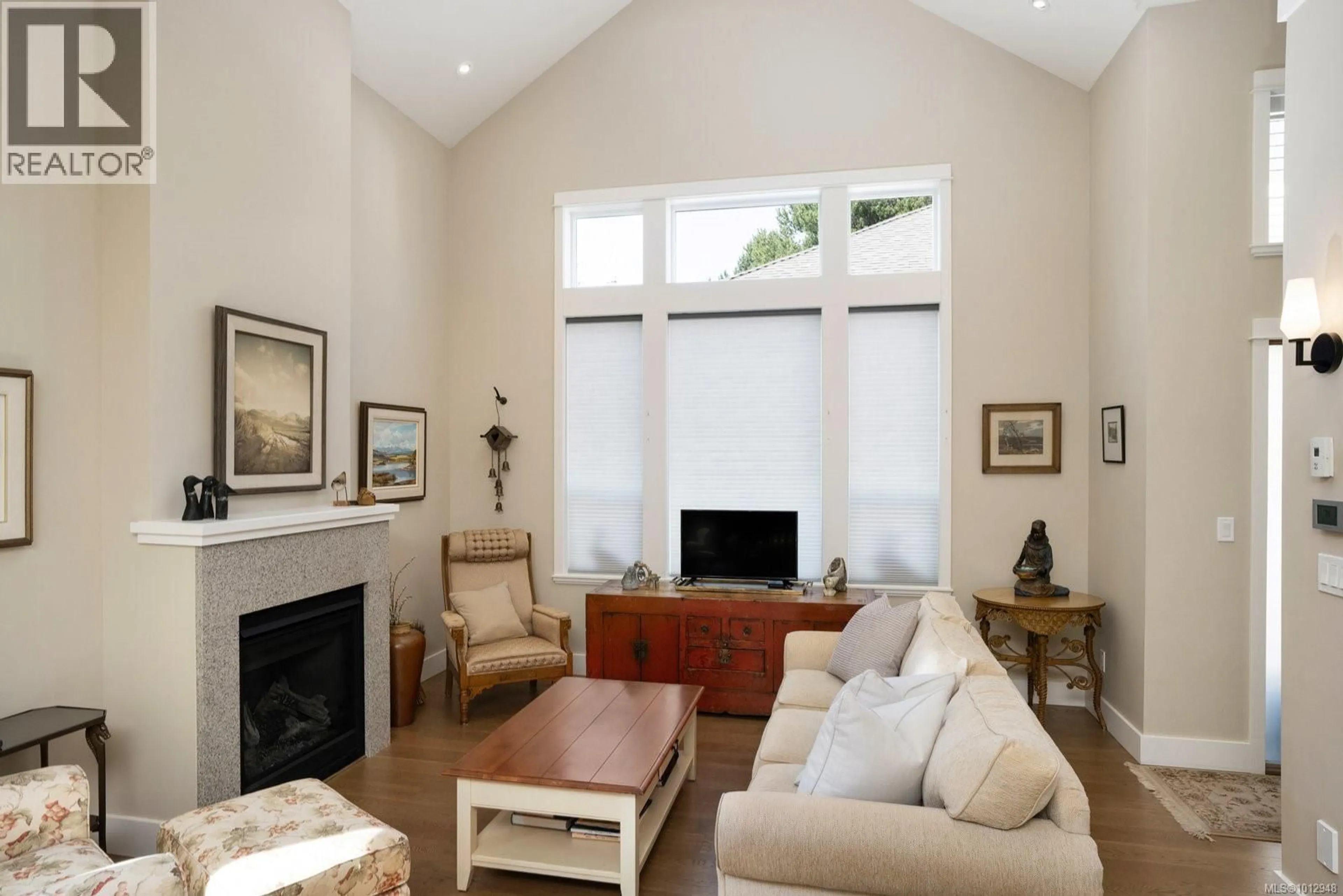 Living room with furniture, wood/laminate floor for 2 - 2430 HENRY AVENUE, Sidney British Columbia V8L2B7