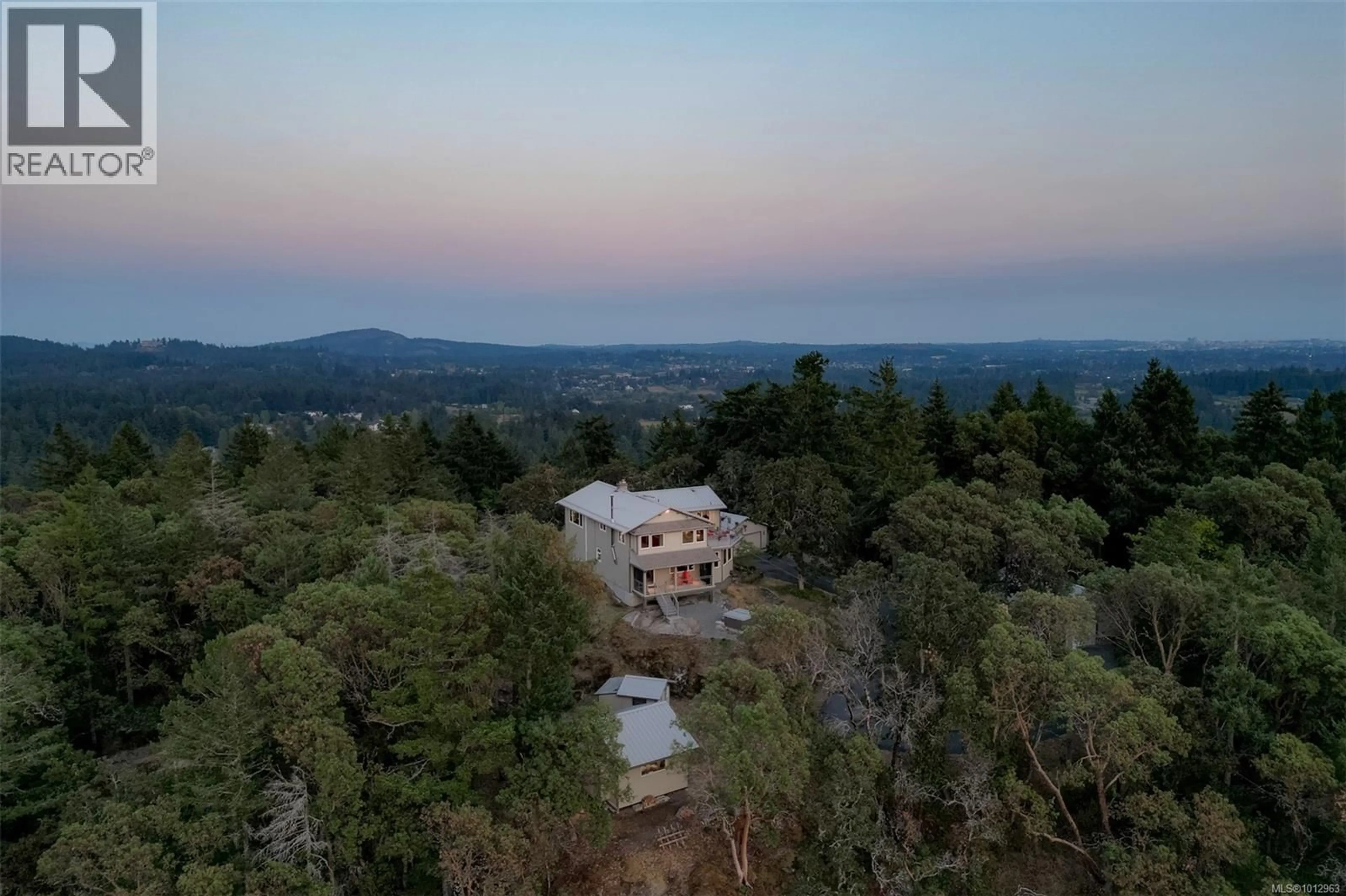 A pic from outside/outdoor area/front of a property/back of a property/a pic from drone, mountain view for 4801 EXCELSIOR ROAD, Saanich British Columbia V9E2E5
