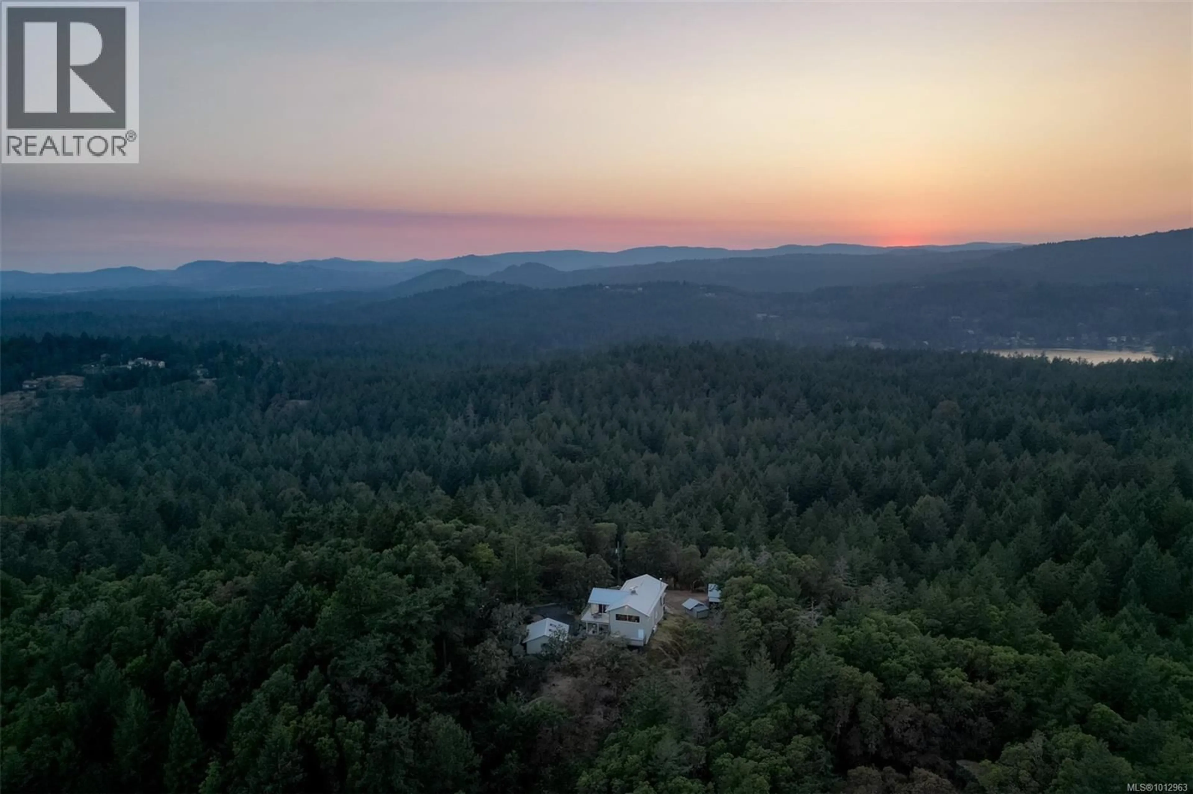 A pic from outside/outdoor area/front of a property/back of a property/a pic from drone, mountain view for 4801 EXCELSIOR ROAD, Saanich British Columbia V9E2E5