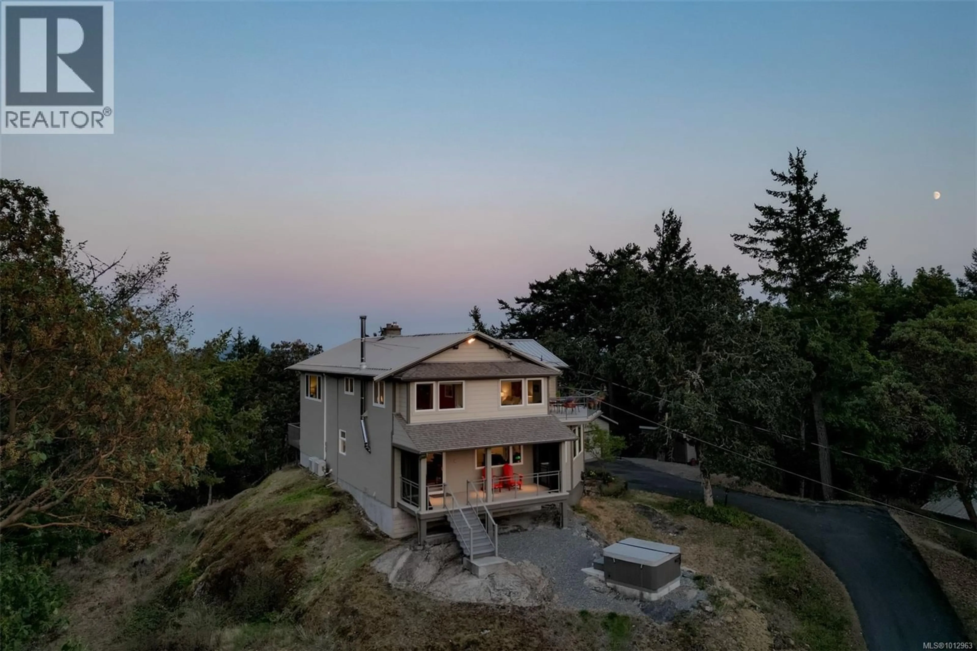 A pic from outside/outdoor area/front of a property/back of a property/a pic from drone, mountain view for 4801 EXCELSIOR ROAD, Saanich British Columbia V9E2E5