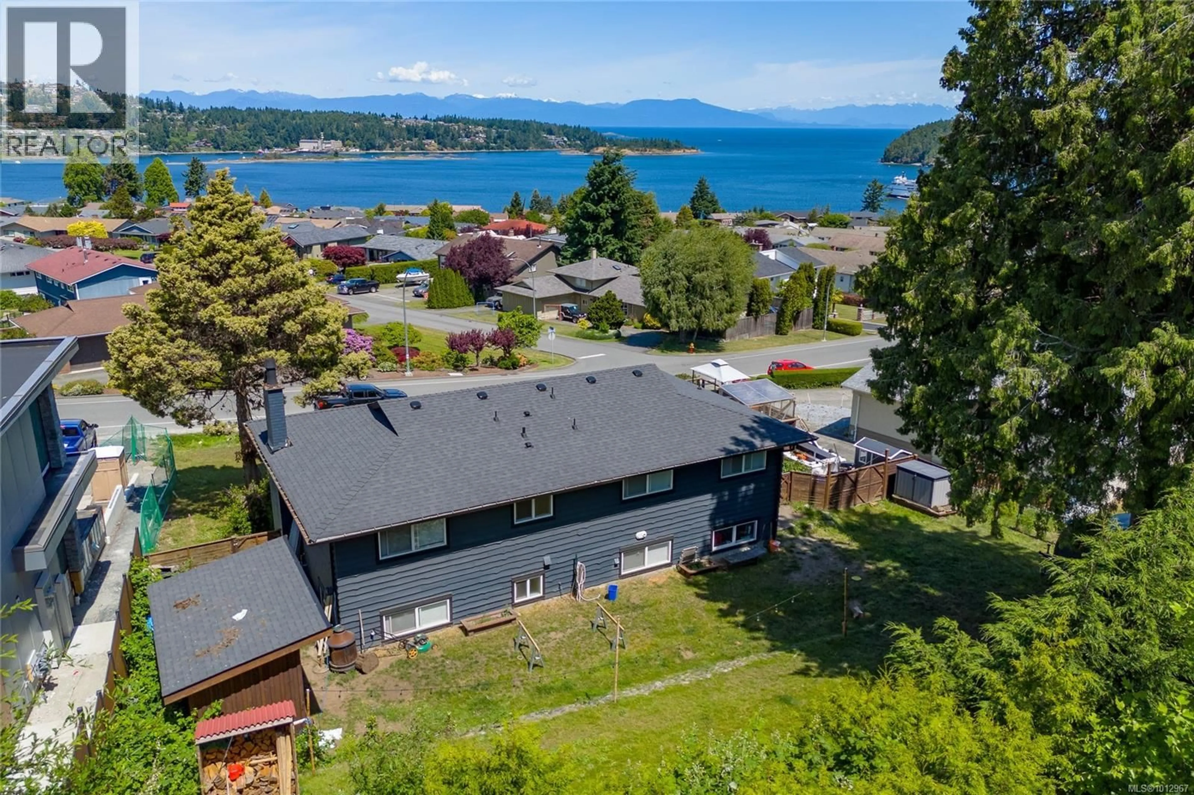 A pic from outside/outdoor area/front of a property/back of a property/a pic from drone, water/lake/river/ocean view for 15 CILAIRE DRIVE, Nanaimo British Columbia V9S3C9