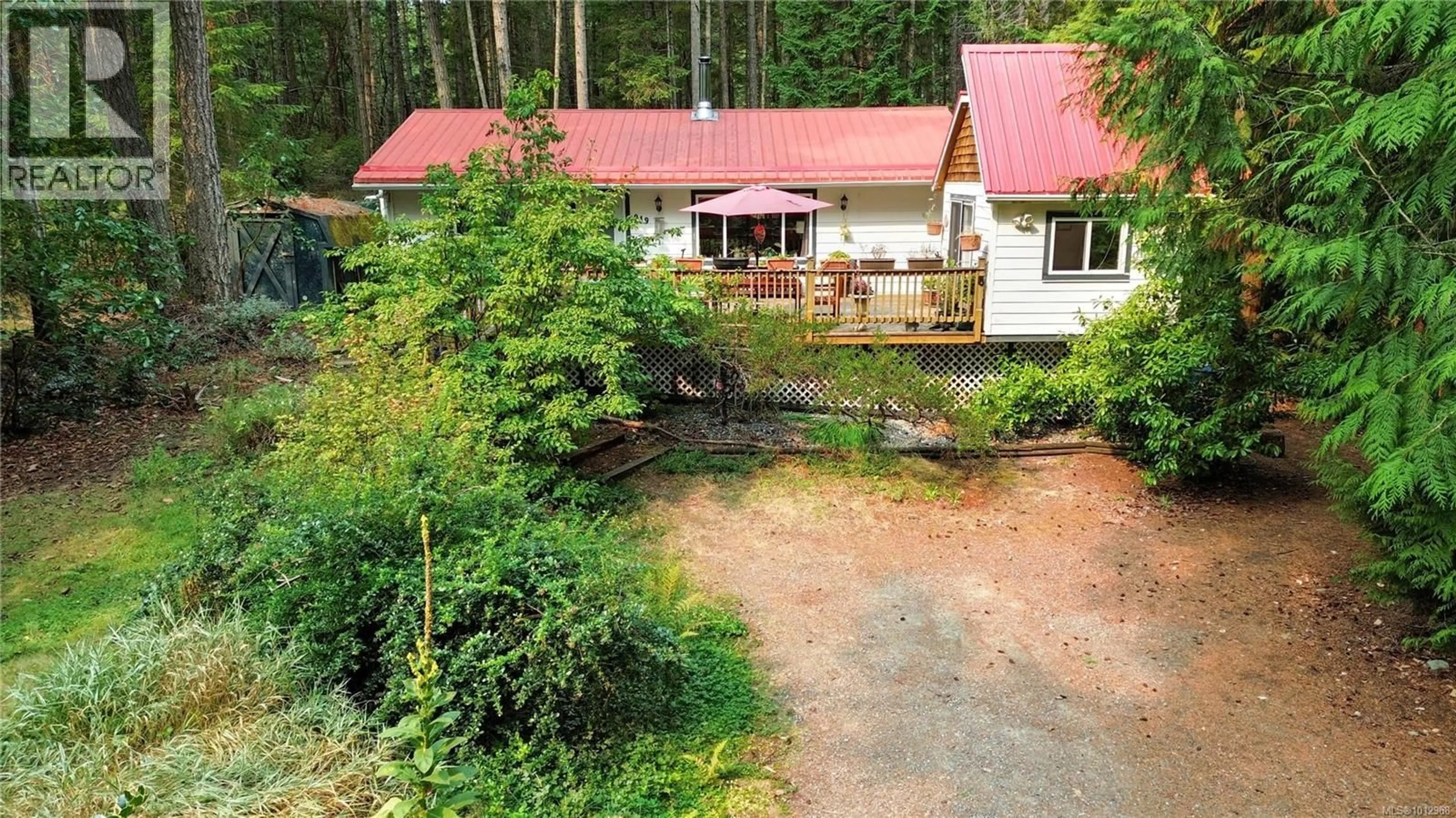 A pic from outside/outdoor area/front of a property/back of a property/a pic from drone, forest/trees view for 949 CARMEN CRESCENT, Gabriola Island British Columbia V0R1X2