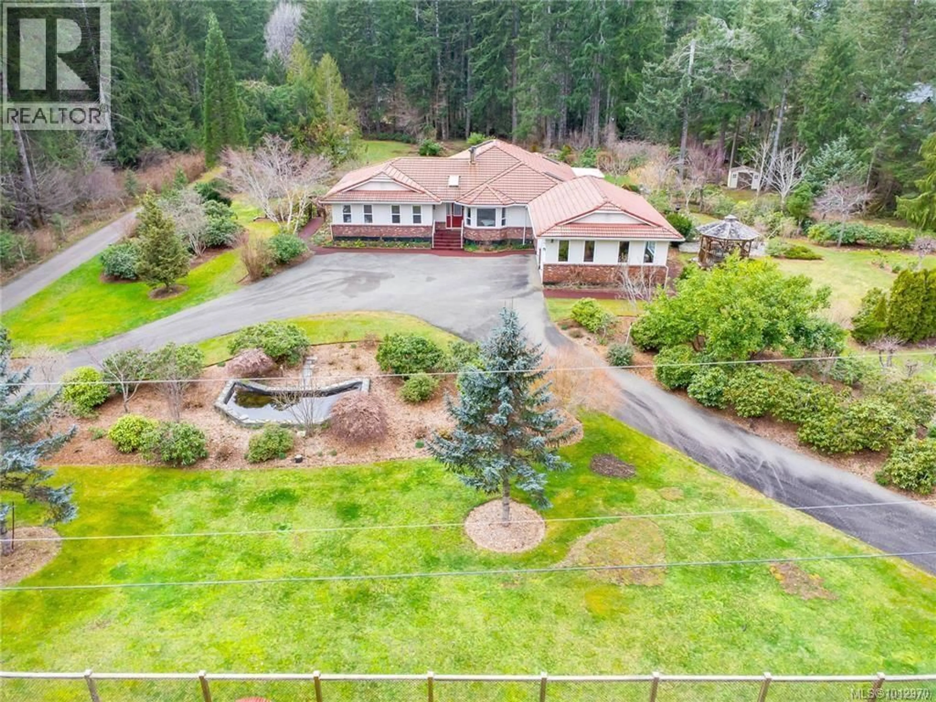 A pic from outside/outdoor area/front of a property/back of a property/a pic from drone, mountain view for 6801 SALFORD ROAD, Port Alberni British Columbia V9Y8V1