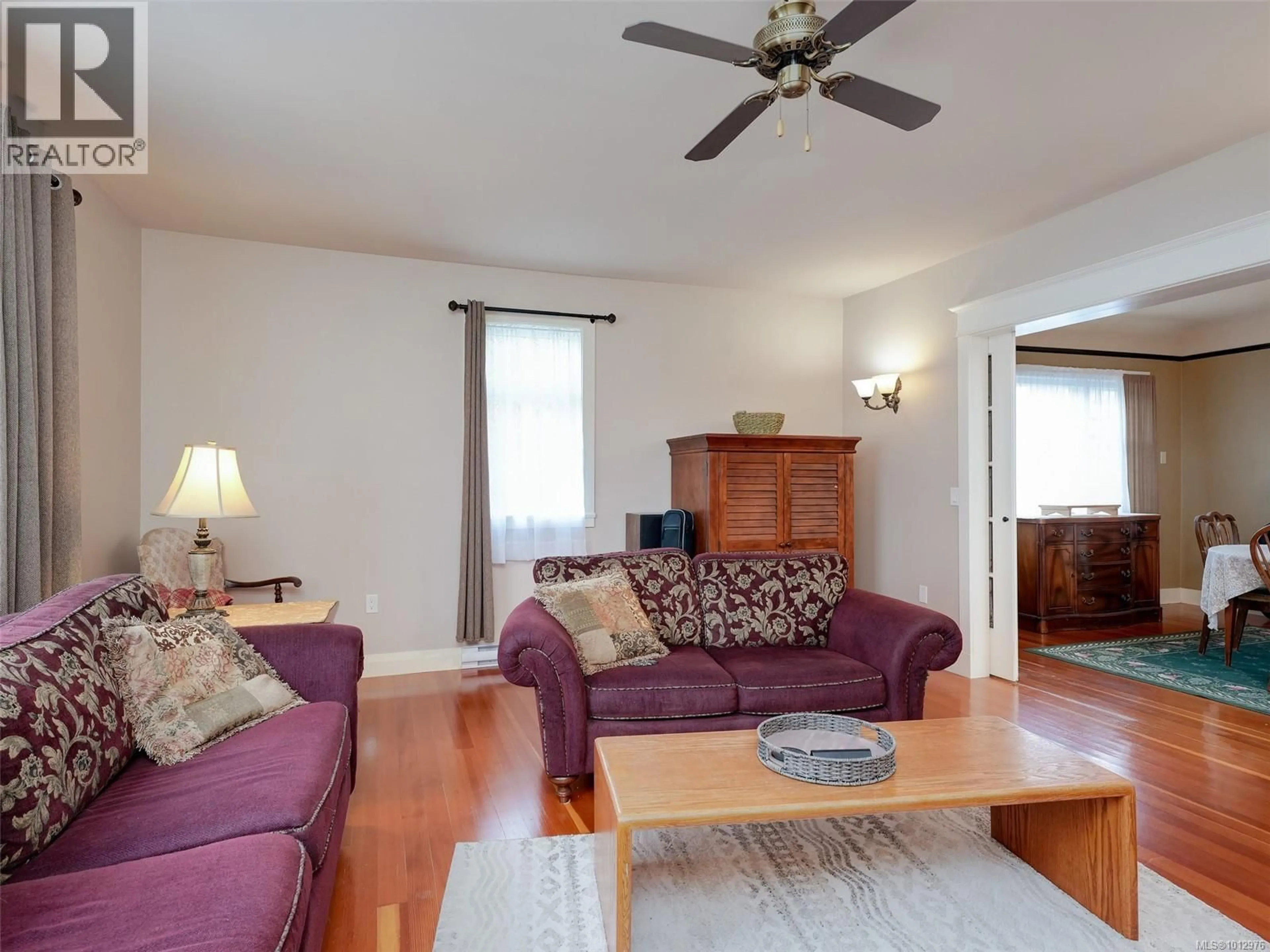 Living room with furniture, wood/laminate floor for 576 OBED AVENUE, Saanich British Columbia V9A1K5
